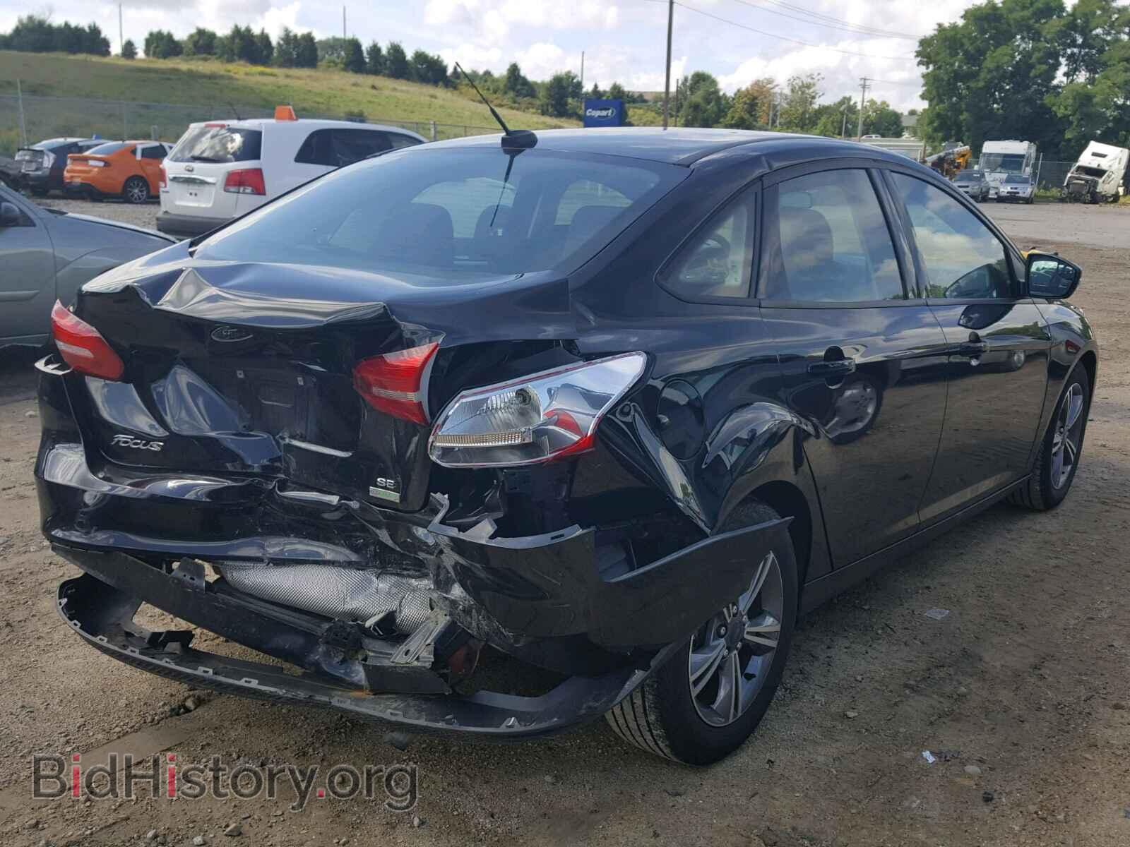 2017 FORD FOCUS - VIN: 1FADP3FE3HL228642 - Photo 4