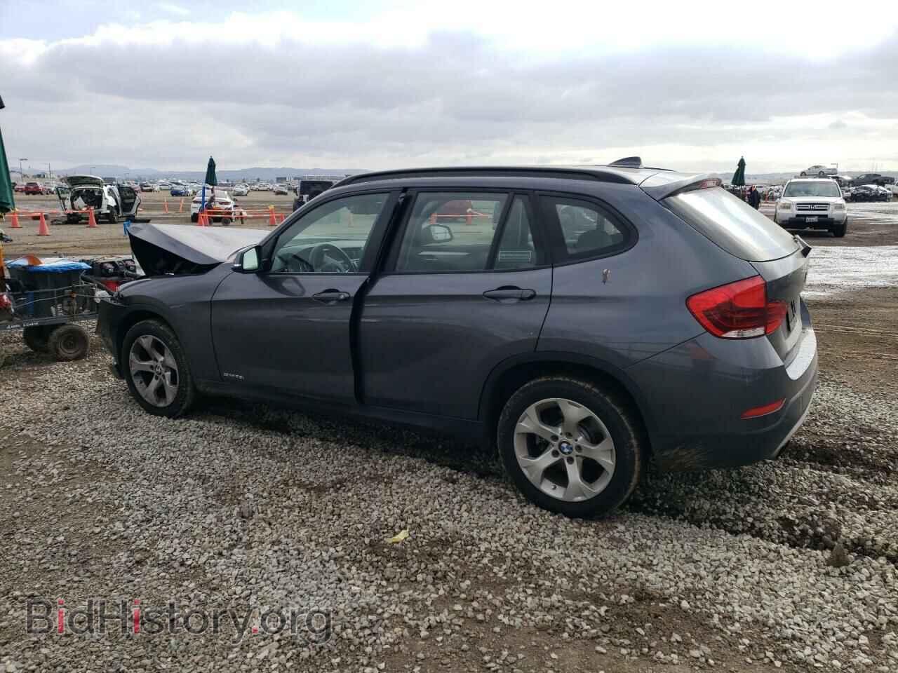 2014 BMW X1 - VIN: WBAVM1C57EVW55786 - Фото 2