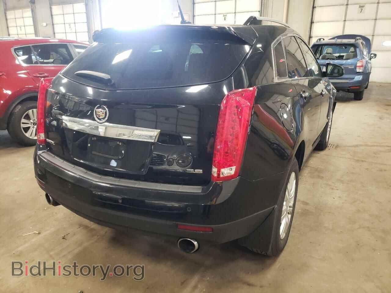 2013 CADILLAC SRX - VIN: 3GYFNCE34DS608290 - Фото 4
