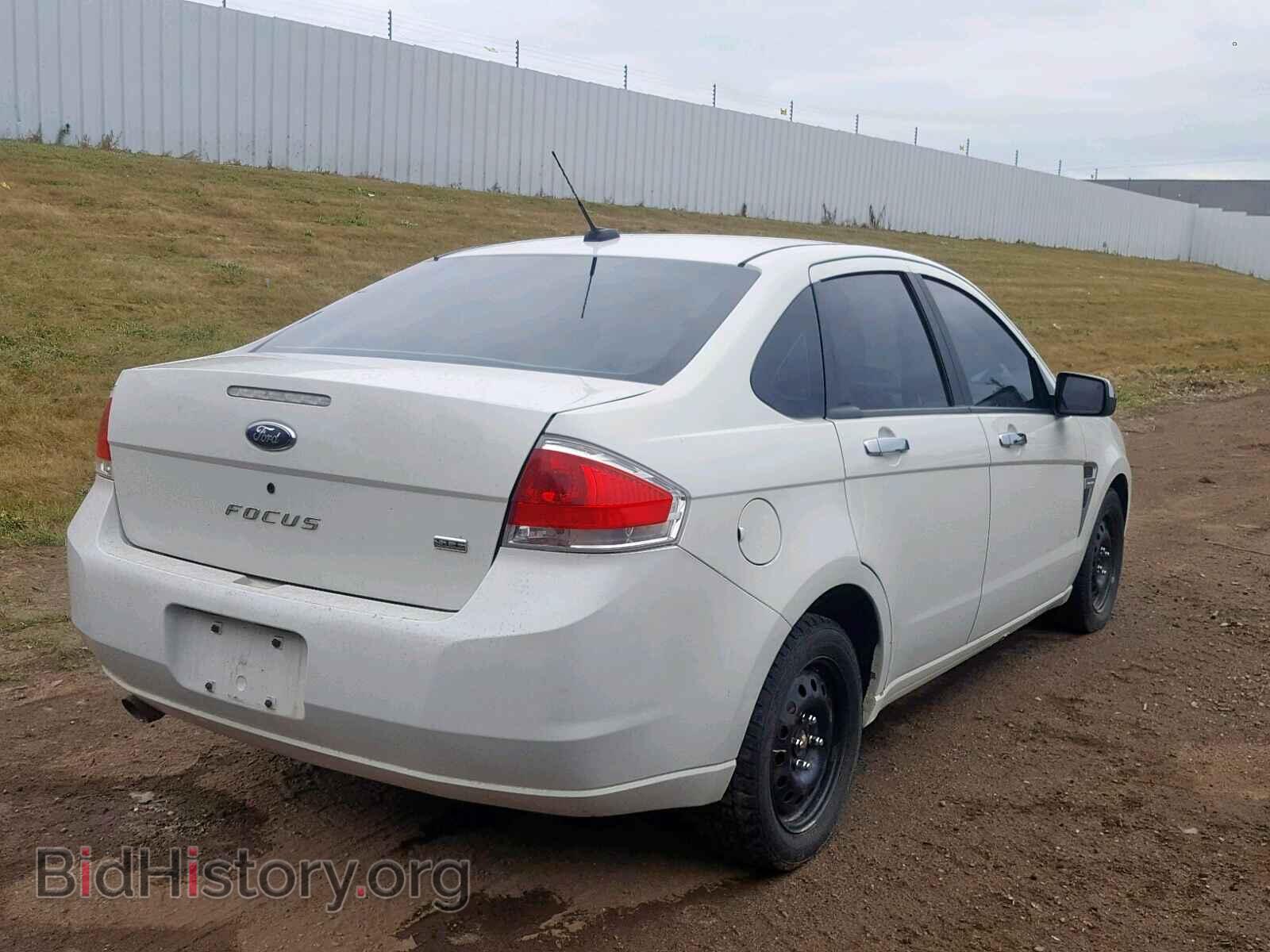 2009 FORD FOCUS - VIN: 1FAHP37N99W137004 - Photo 4