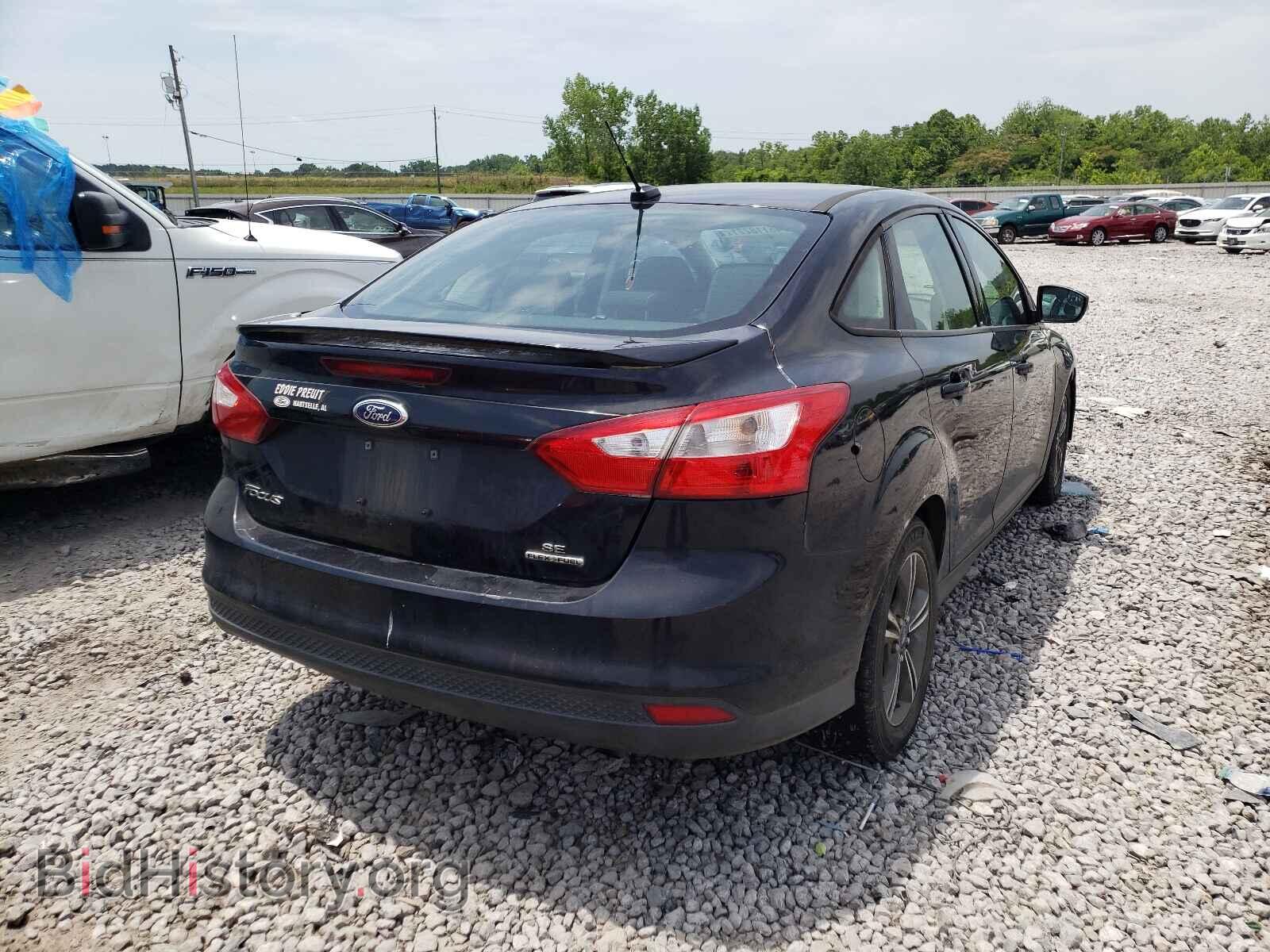 2014 FORD FOCUS - VIN: 1FADP3F21EL215955 - Photo 4