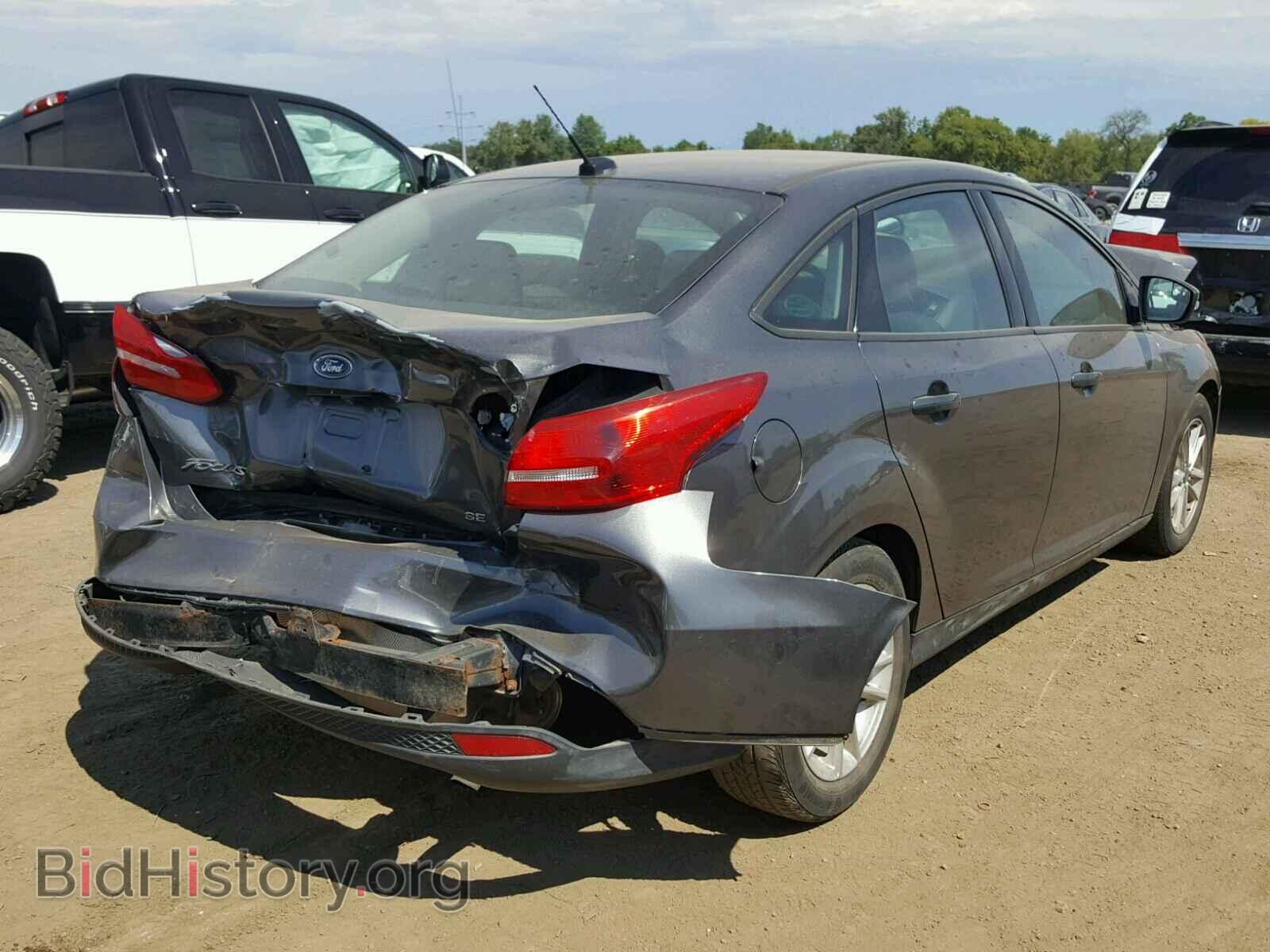 2015 FORD FOCUS - VIN: 1FADP3F29FL206597 - Photo 4