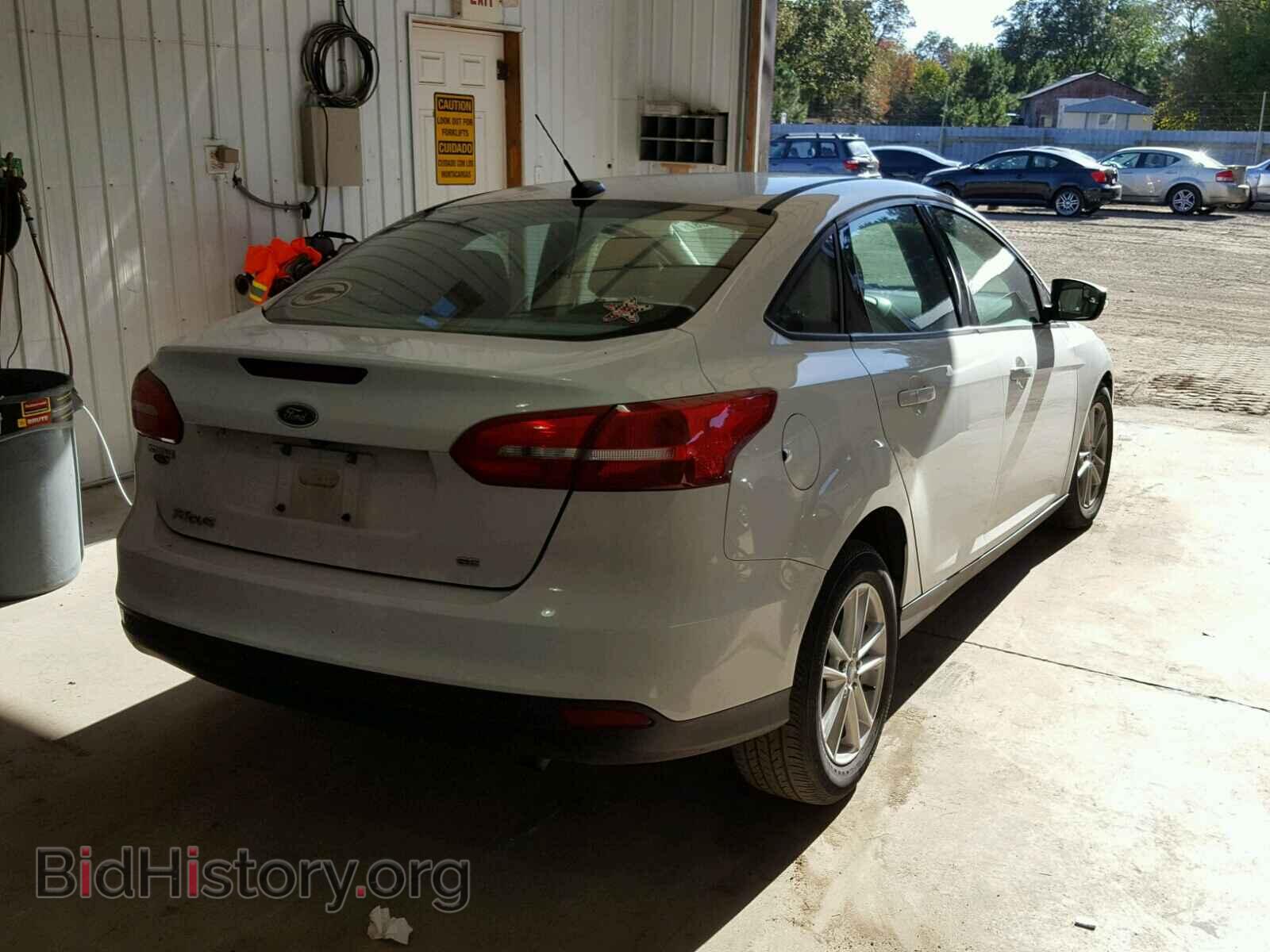 2015 FORD FOCUS - VIN: 1FADP3F2XFL322486 - Photo 4