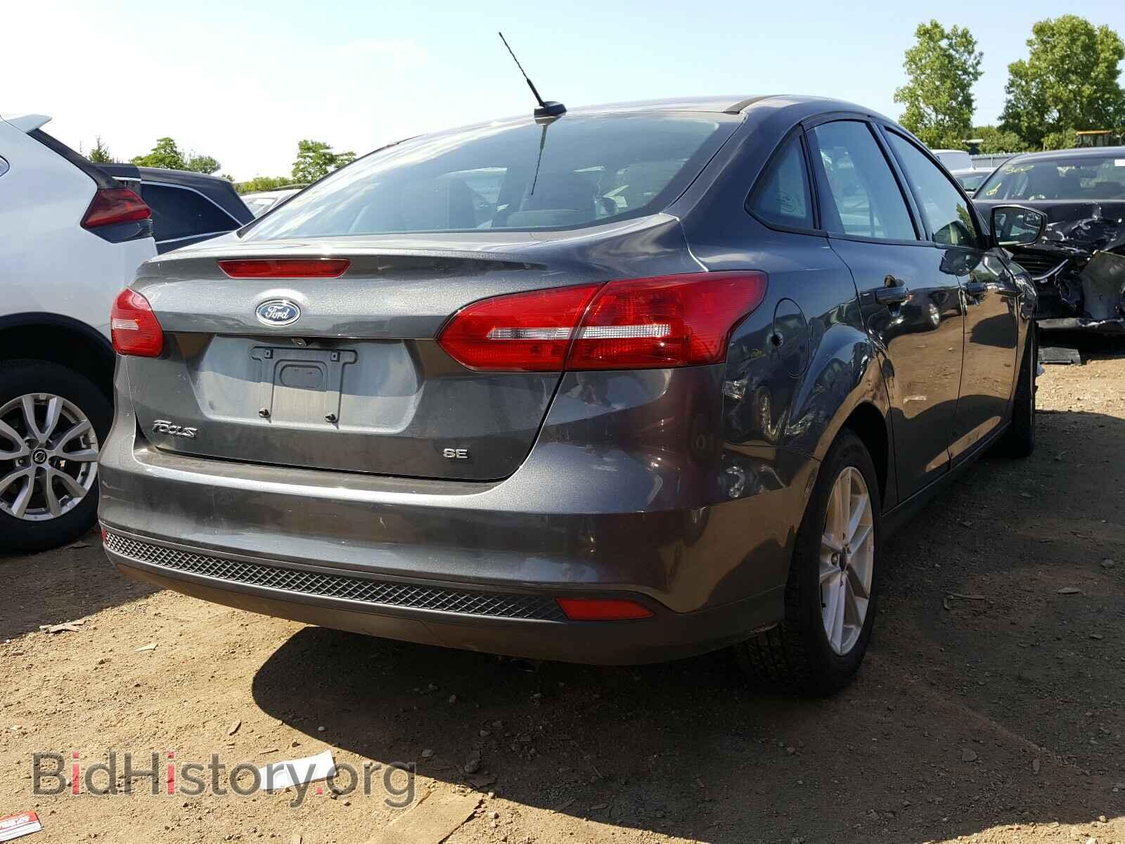 2017 FORD FOCUS - VIN: 1FADP3F24HL328075 - Photo 4