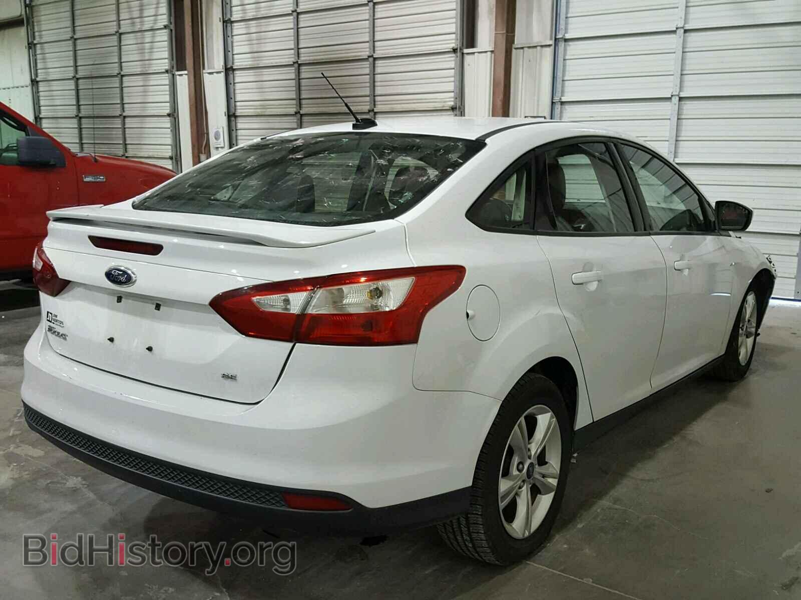 2012 Ford FOCUS (VIN 1FAHP3F29CL153929) — фото 4 из 10
