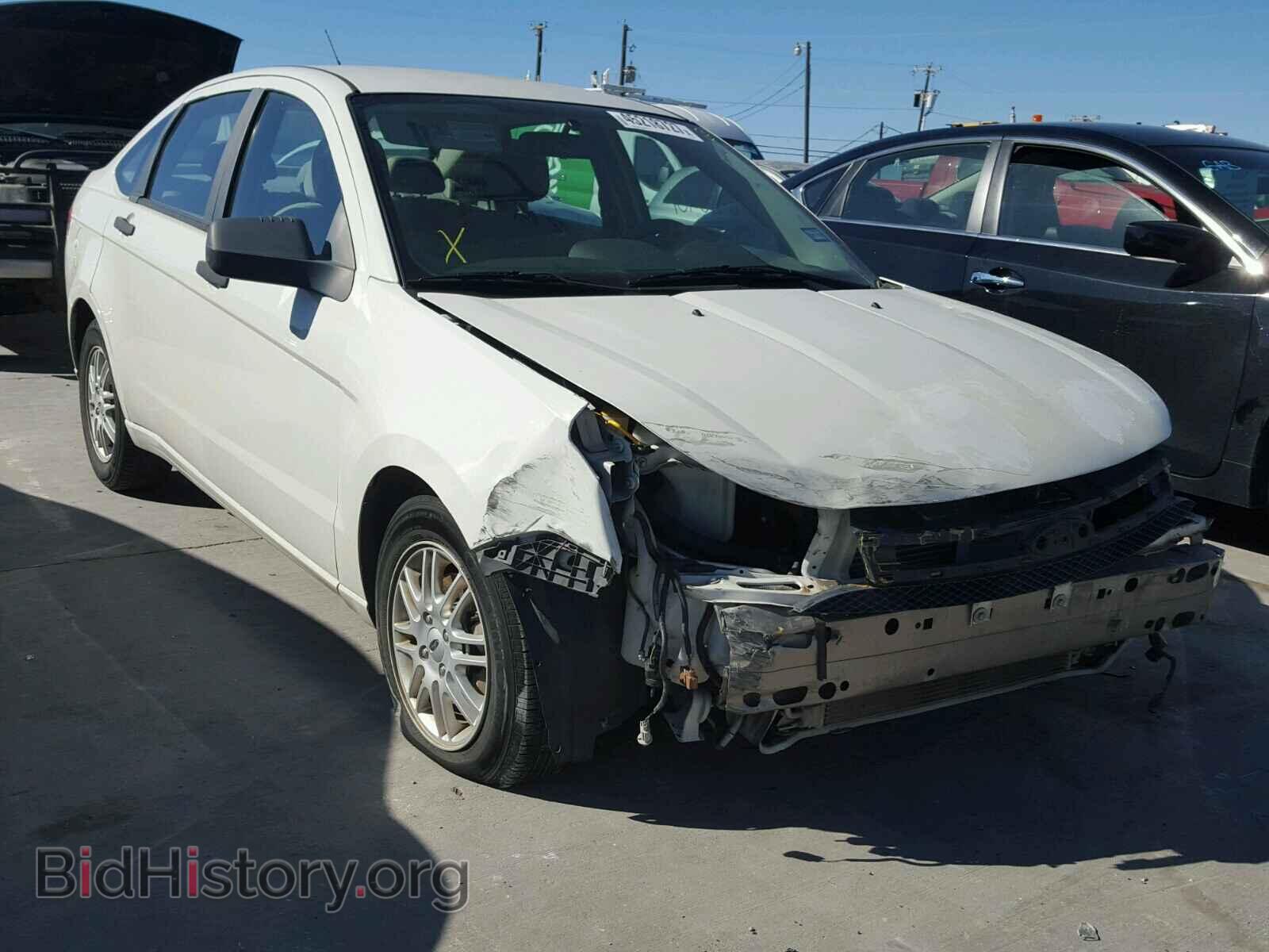 Фотография 1FAHP35NX9W148628 - FORD FOCUS 2009