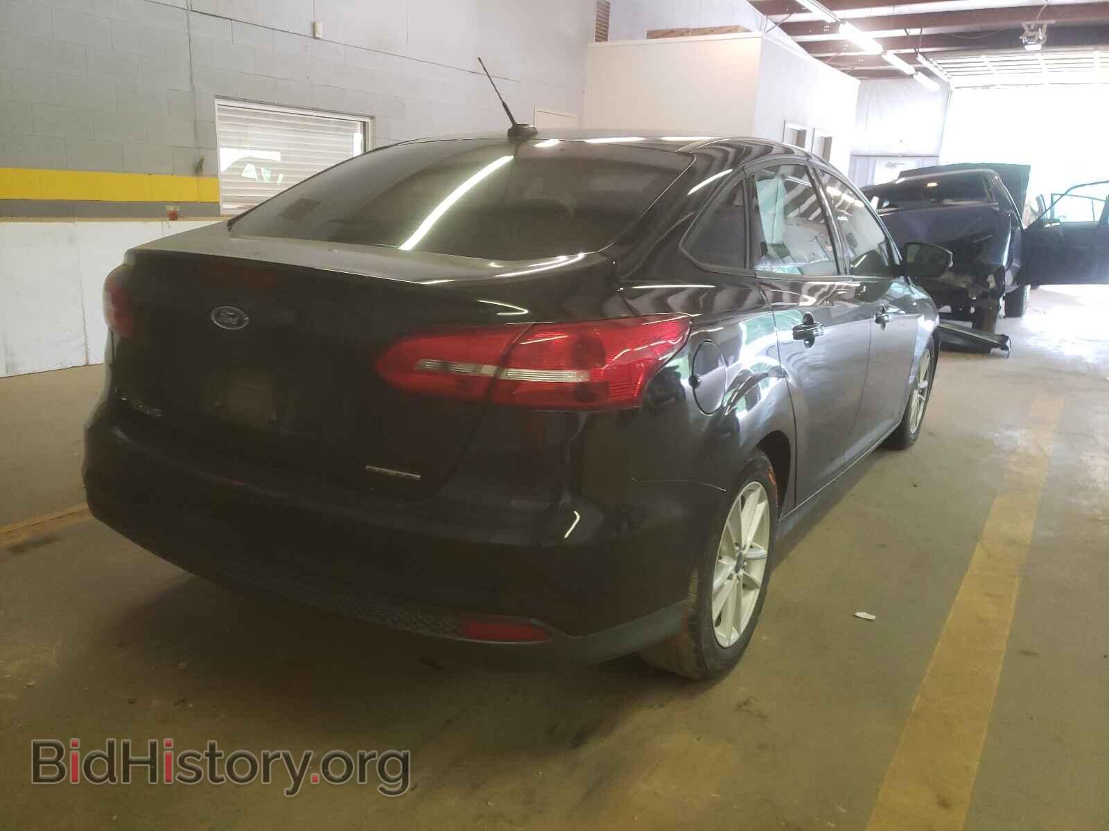 2015 FORD FOCUS - VIN: 1FADP3F28FL297975 - Photo 4