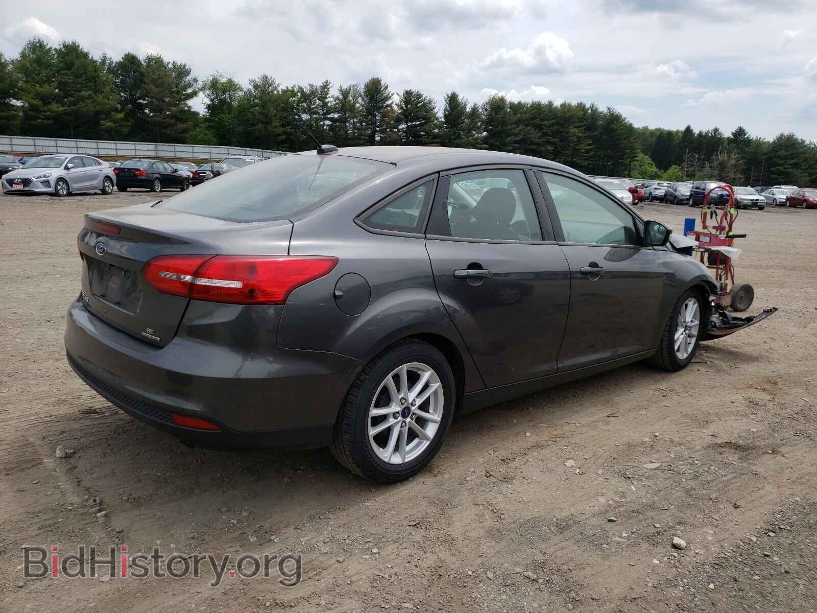 2015 FORD FOCUS - VIN: 1FADP3F22FL204982 - Photo 4