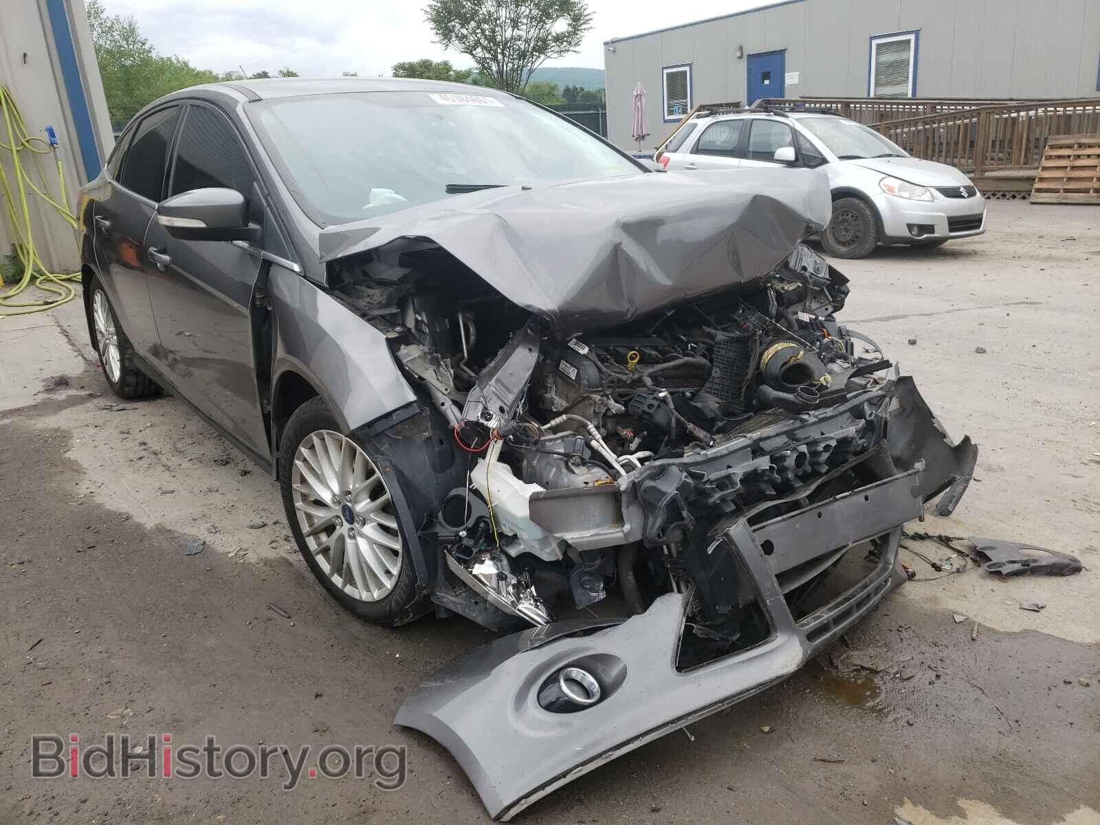 Фотография 1FADP3J21EL409487 - FORD FOCUS 2014