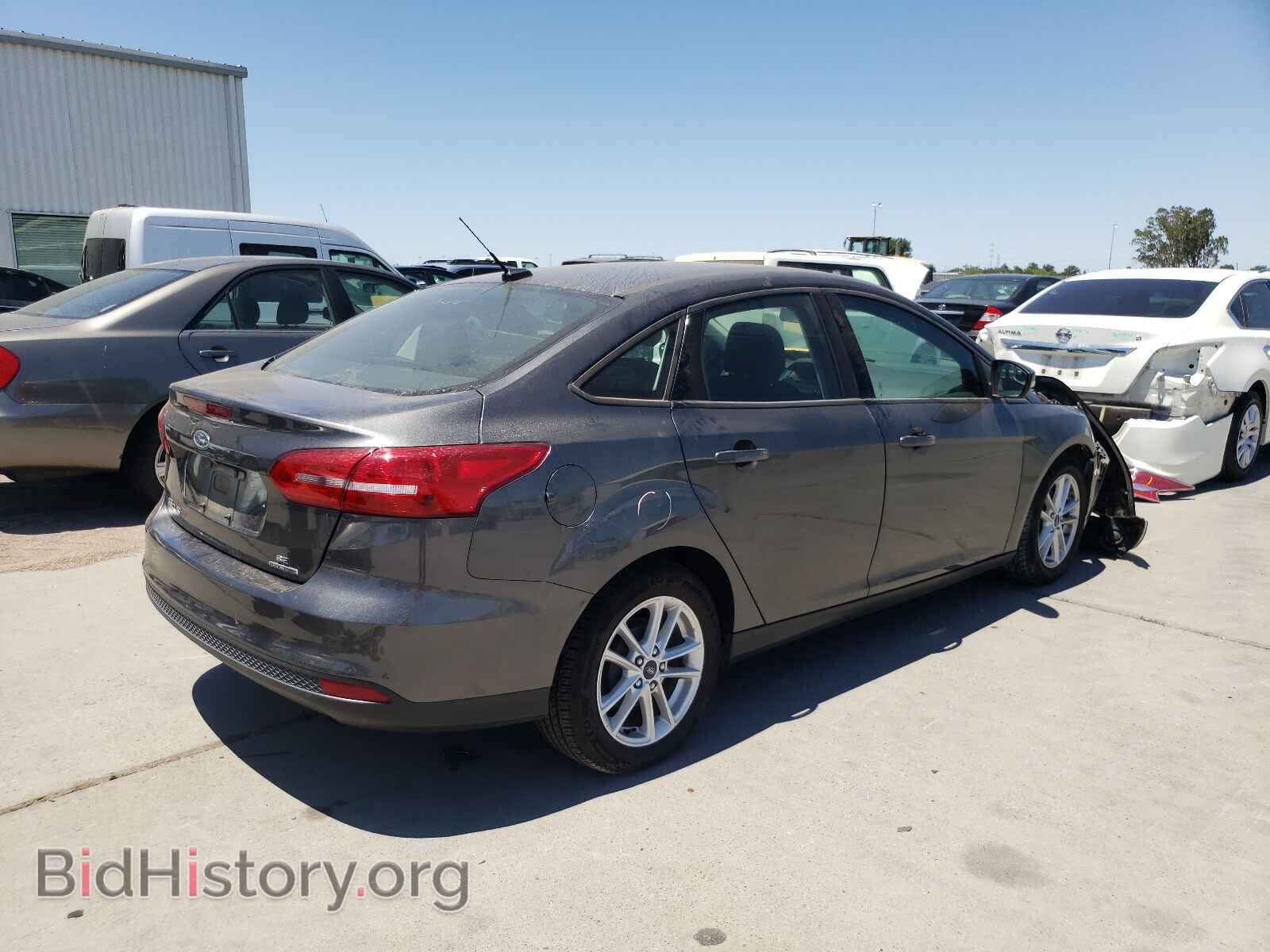 2016 FORD FOCUS - VIN: 1FADP3F2XGL379420 - Фото 4