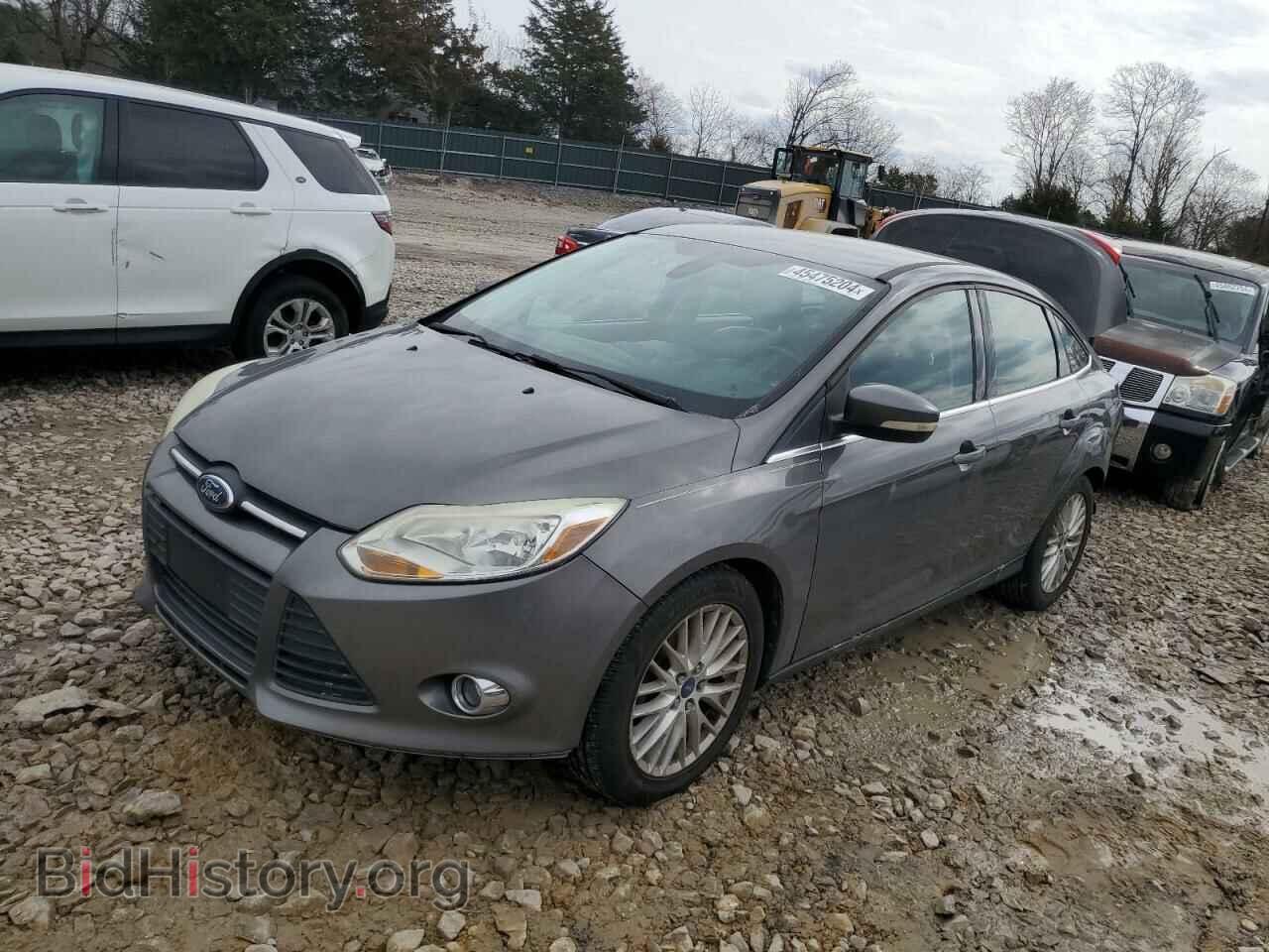 Фотография 1FAHP3H21CL304159 - FORD FOCUS 2012
