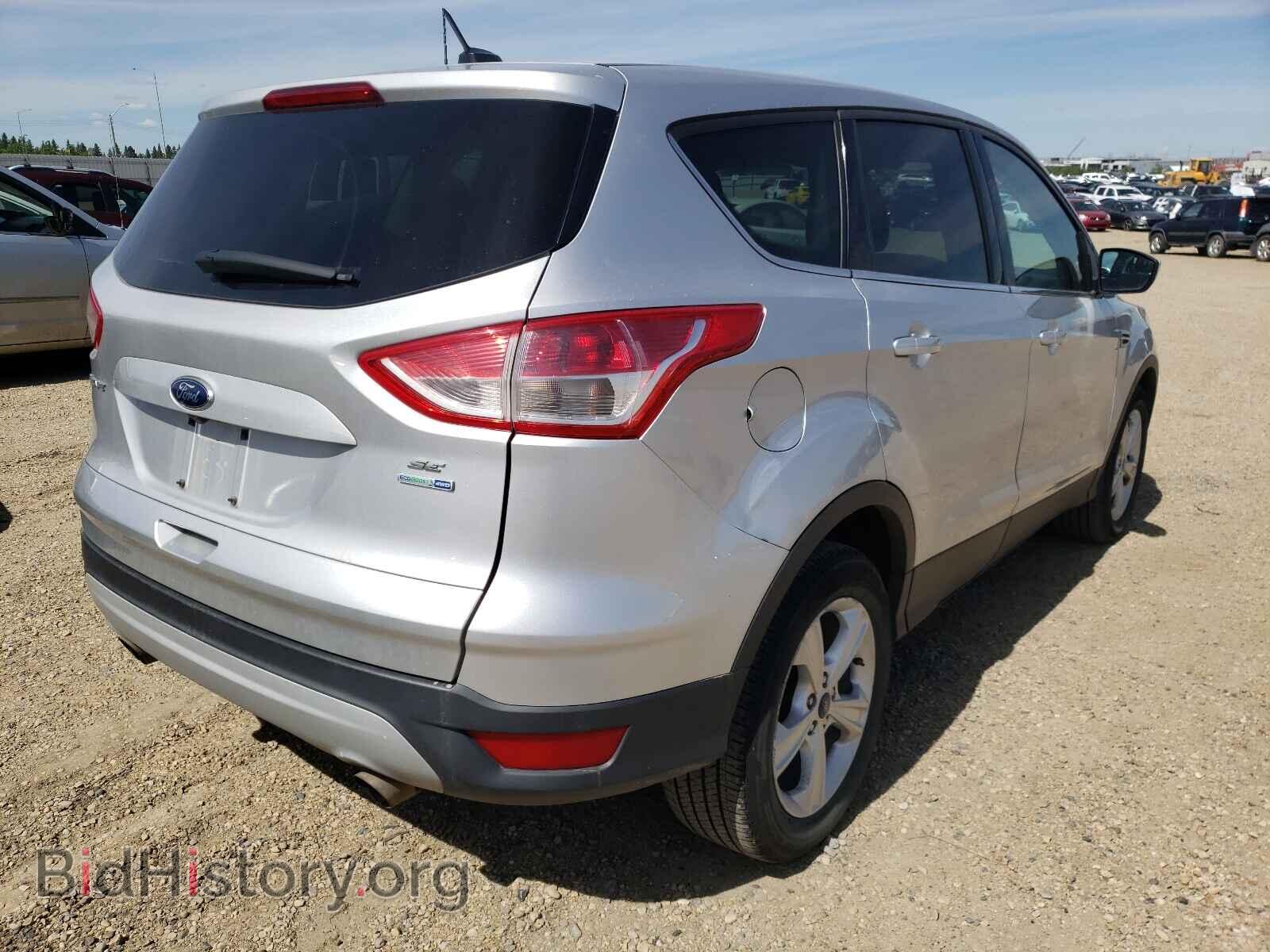 2014 FORD ESCAPE - VIN: 1FMCU9GX4EUD82957 - Фото 4