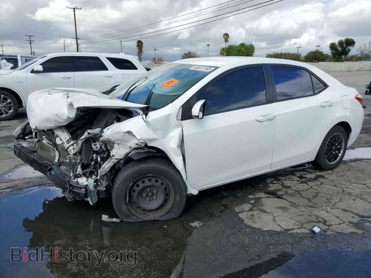 Фотография 5YFBURHEXGP502144 - TOYOTA COROLLA 2016