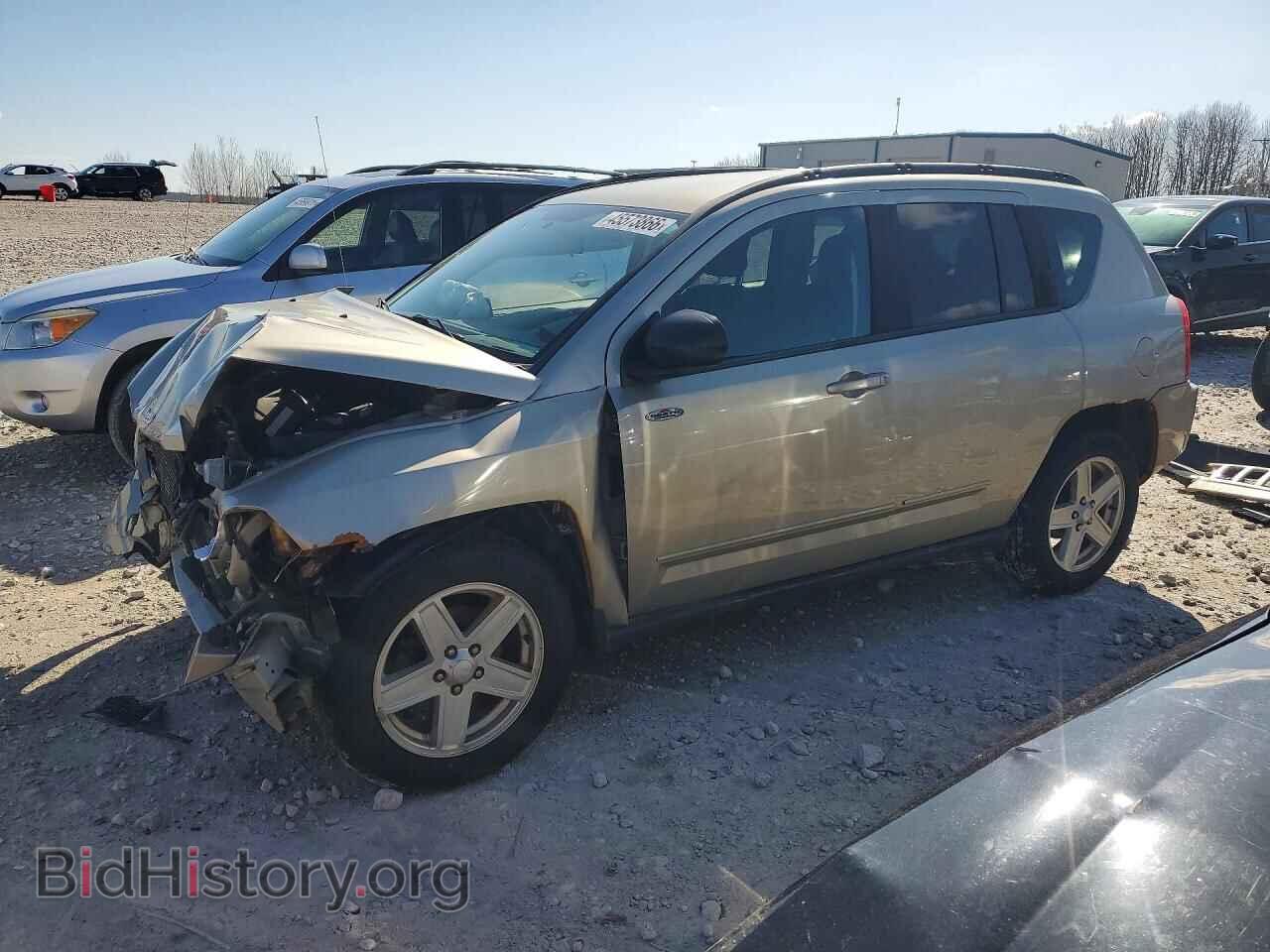Photo 1J4NF4FB3AD553024 - JEEP COMPASS 2010