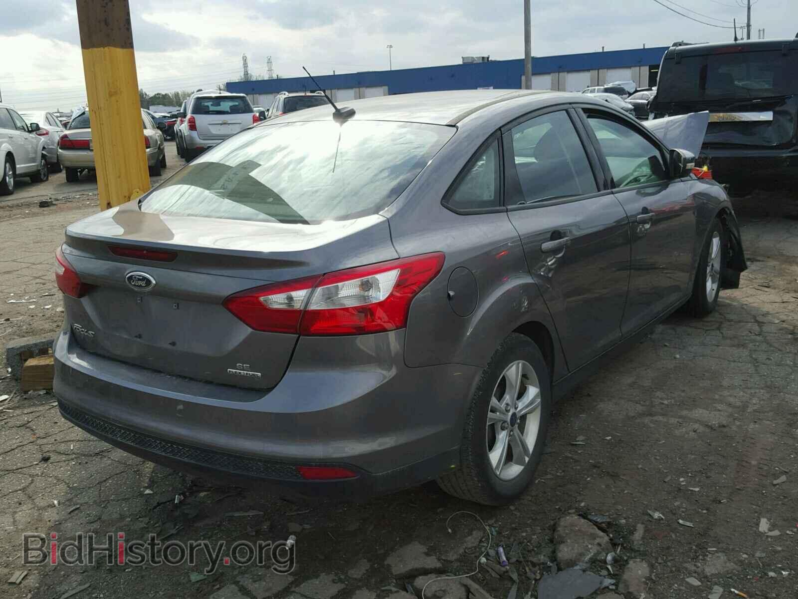 2014 FORD FOCUS - VIN: 1FADP3F2XEL389295 - Photo 4