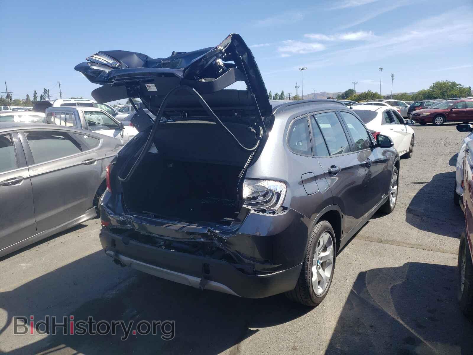 2014 BMW X1 - VIN: WBAVM1C5XEVW52011 - Фото 4