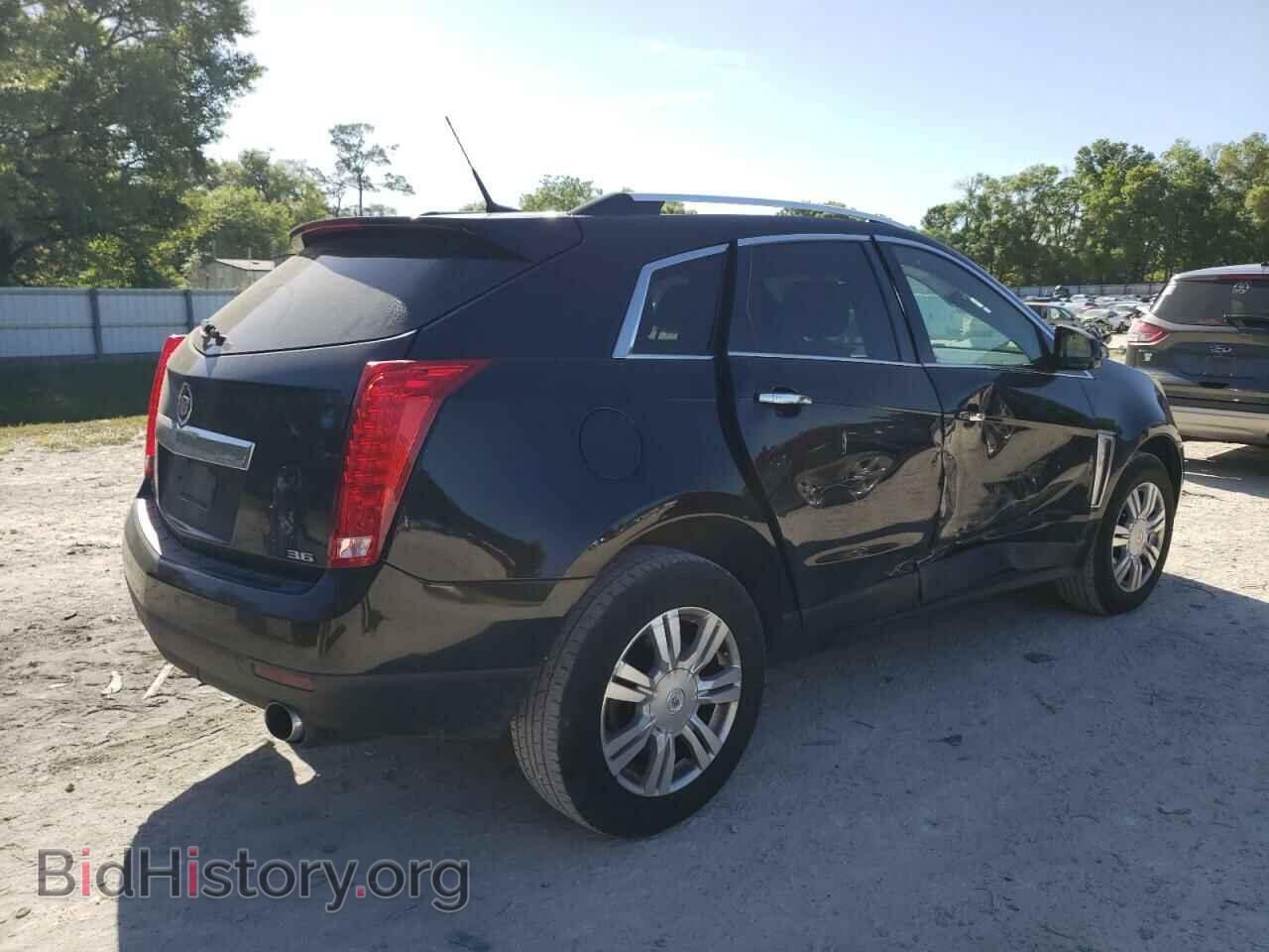 2014 CADILLAC SRX - VIN: 3GYFNEE34ES658202 - Фото 3