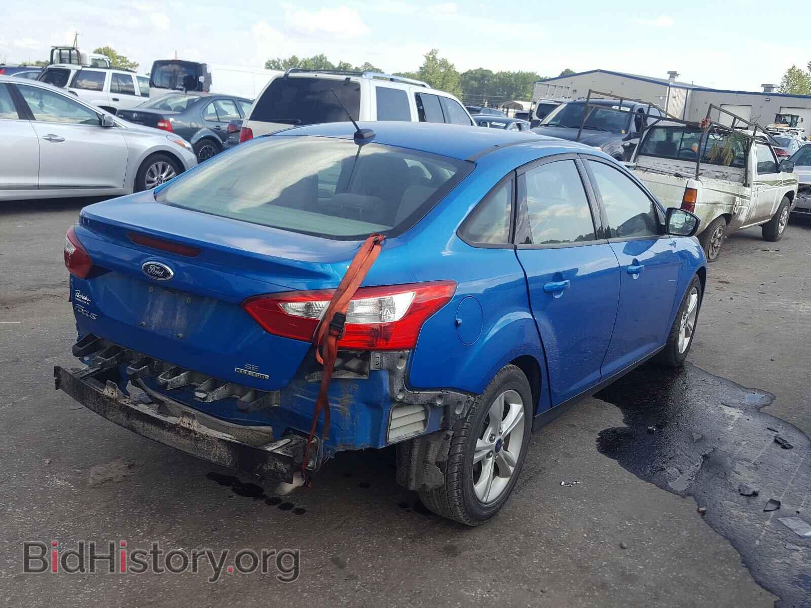 2014 FORD FOCUS - VIN: 1FADP3F21EL402953 - Photo 4