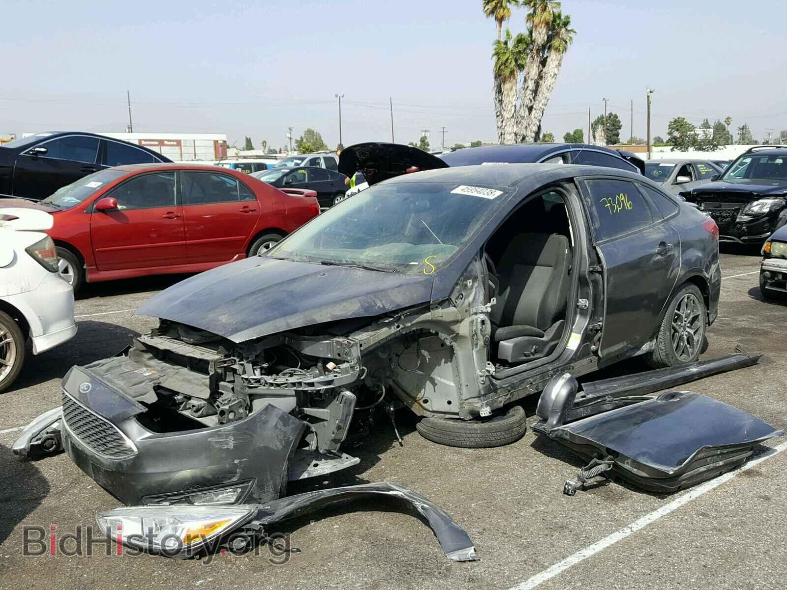 2016 FORD FOCUS - VIN: 1FADP3F21GL275818 - Фото 2