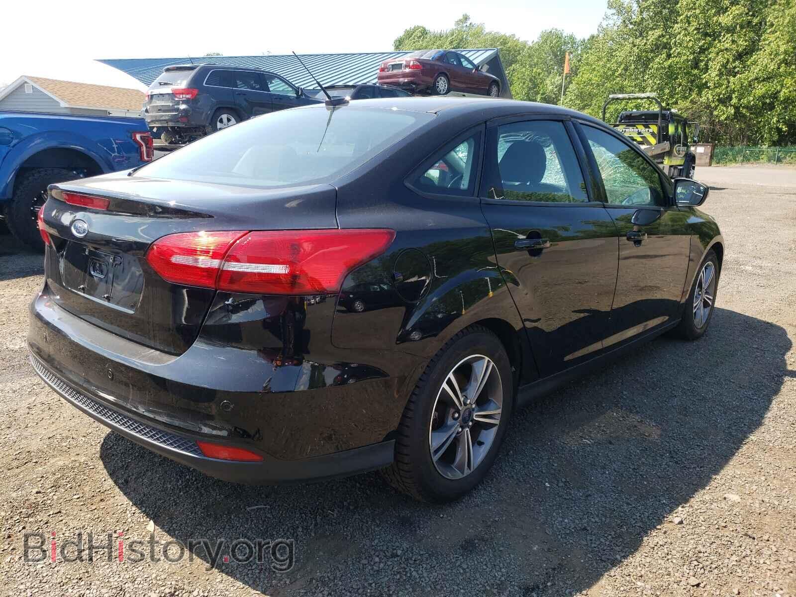 2016 FORD FOCUS - VIN: 1FADP3FE4GL298410 - Photo 4