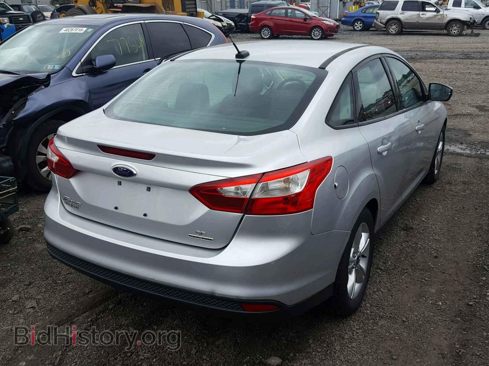 2014 FORD FOCUS - VIN: 1FADP3F28EL160923 - Photo 4