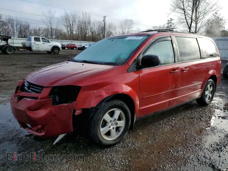 2010 Dodge CARAVAN Grand Cara (VIN 2D4RN4DE9AR107659) — photo 1 of 13, Copart, damage: front end