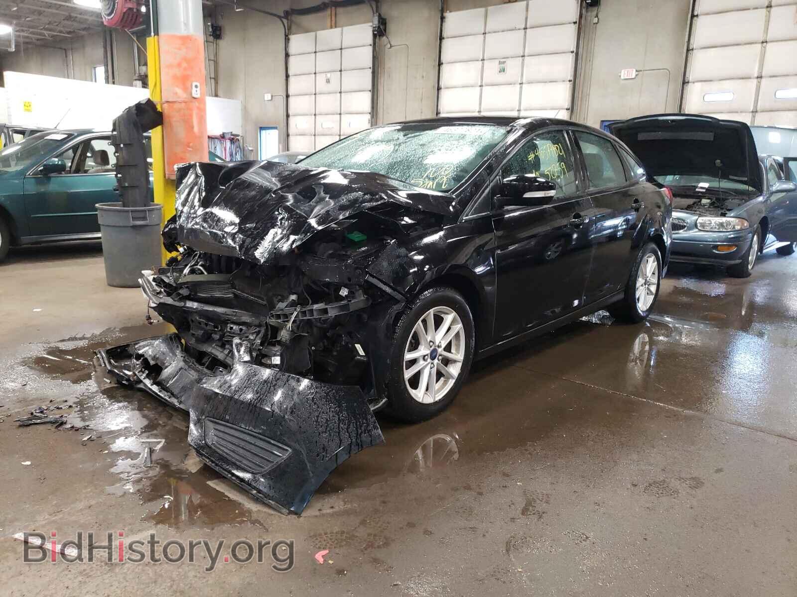2016 FORD FOCUS - VIN: 1FADP3F21GL244424 - Photo 2