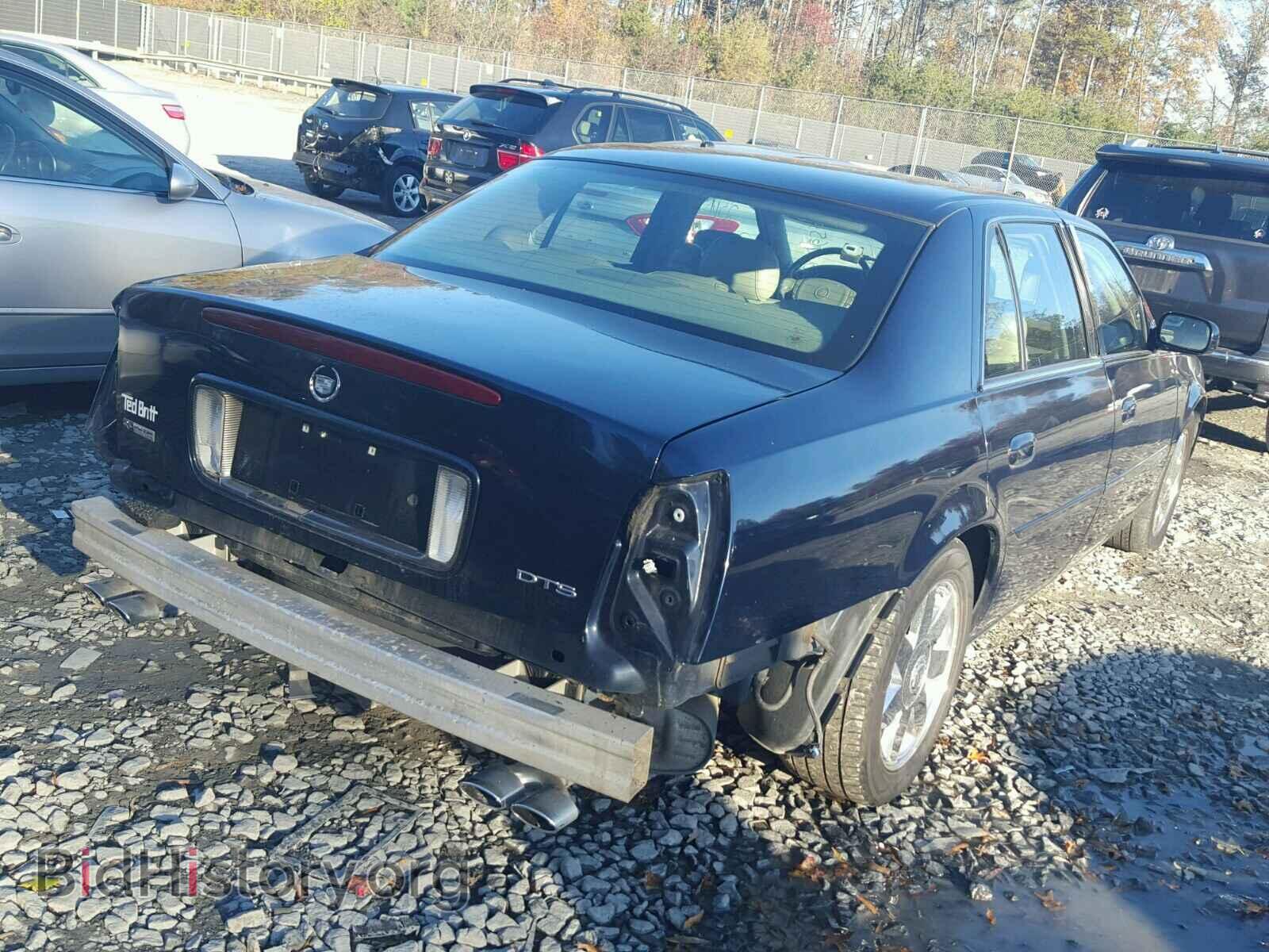 2004 CADILLAC DEVILLE - VIN: 1G6KF579X4U131186 - Photo 4