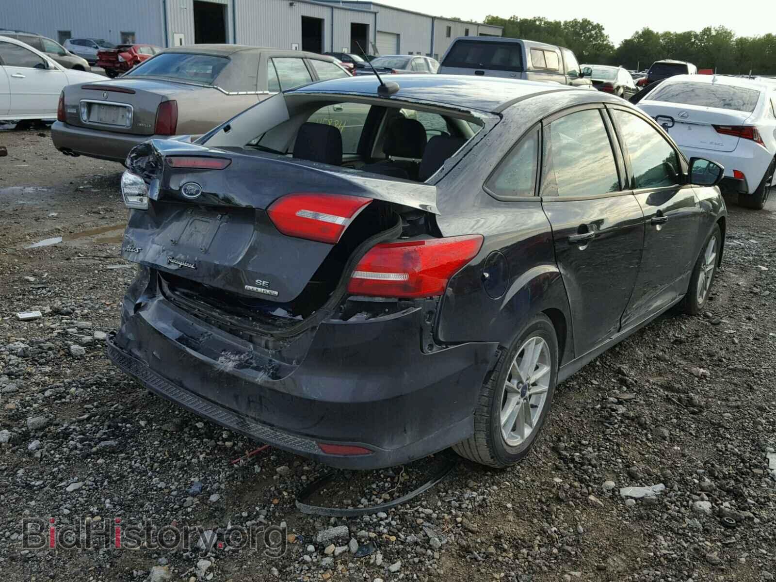 2015 FORD FOCUS - VIN: 1FADP3F24FL385017 - Photo 4