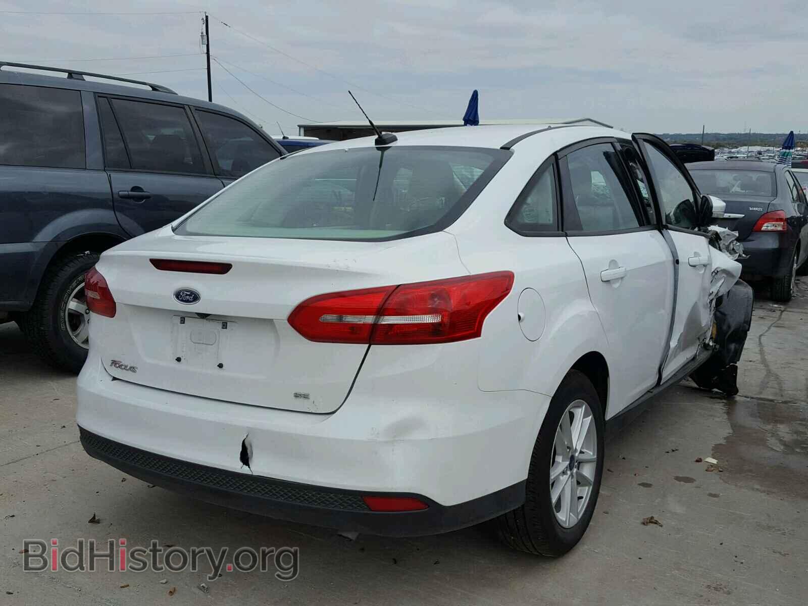 2017 FORD FOCUS - VIN: 1FADP3F2XHL210449 - Photo 4