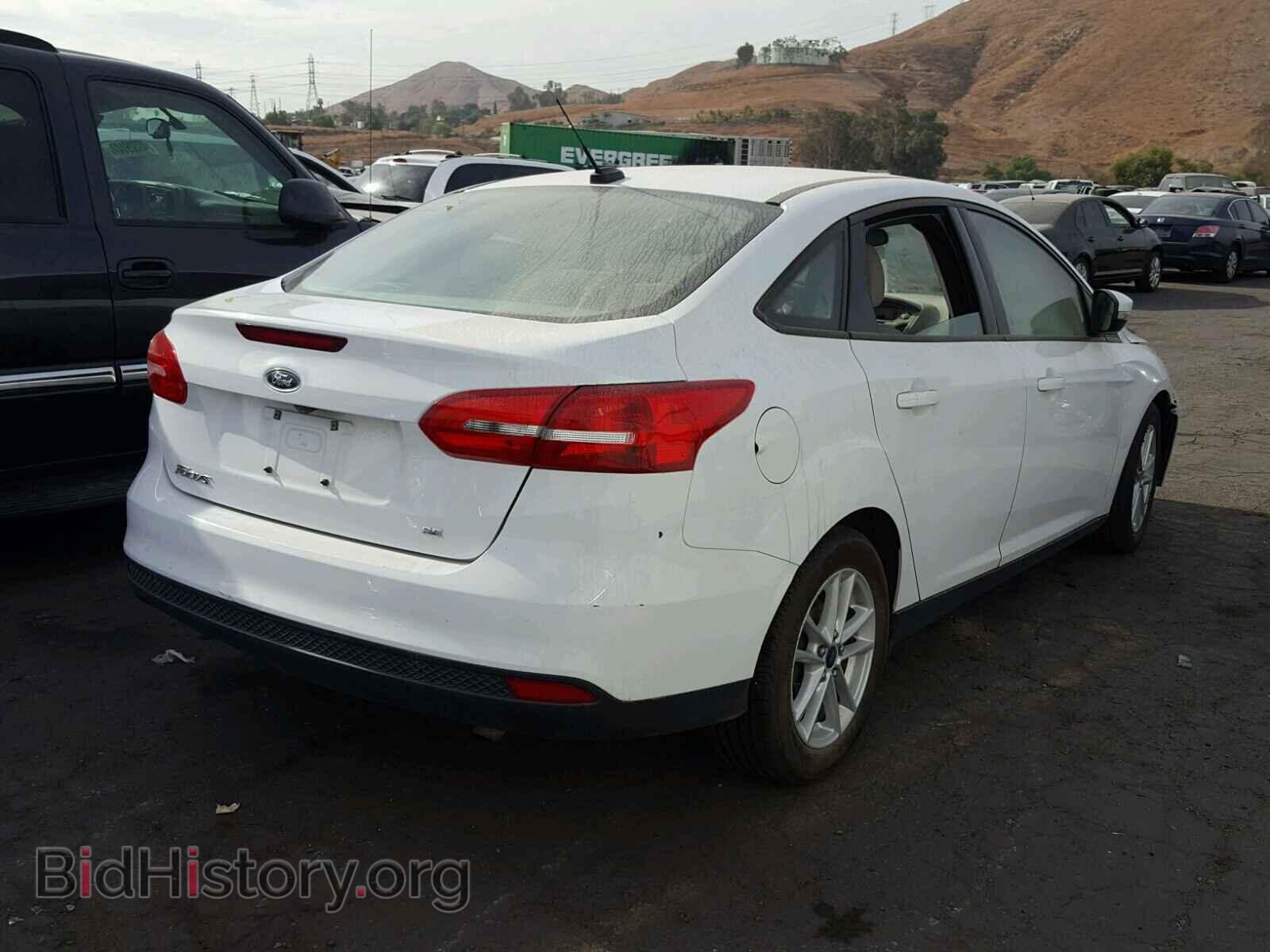 2015 FORD FOCUS - VIN: 1FADP3F29FL204736 - Photo 4
