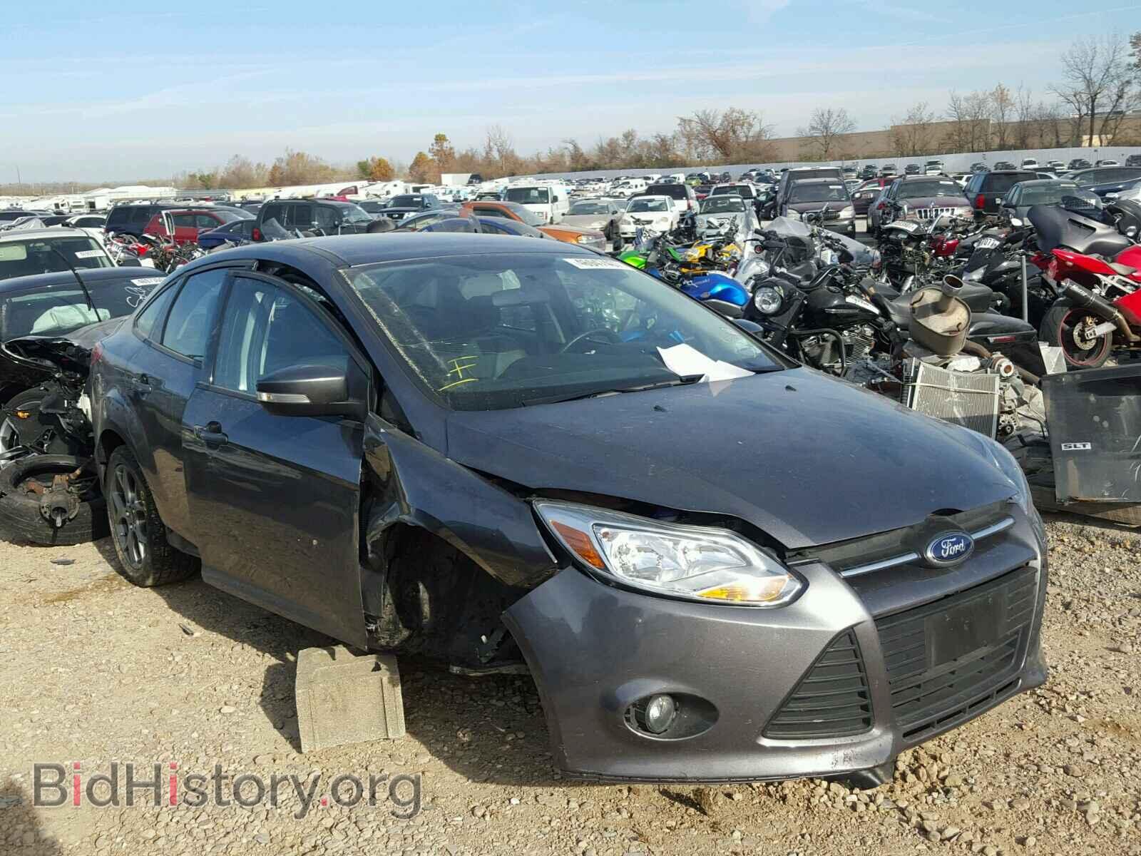 Фотография 1FADP3F29EL404014 - FORD FOCUS 2014