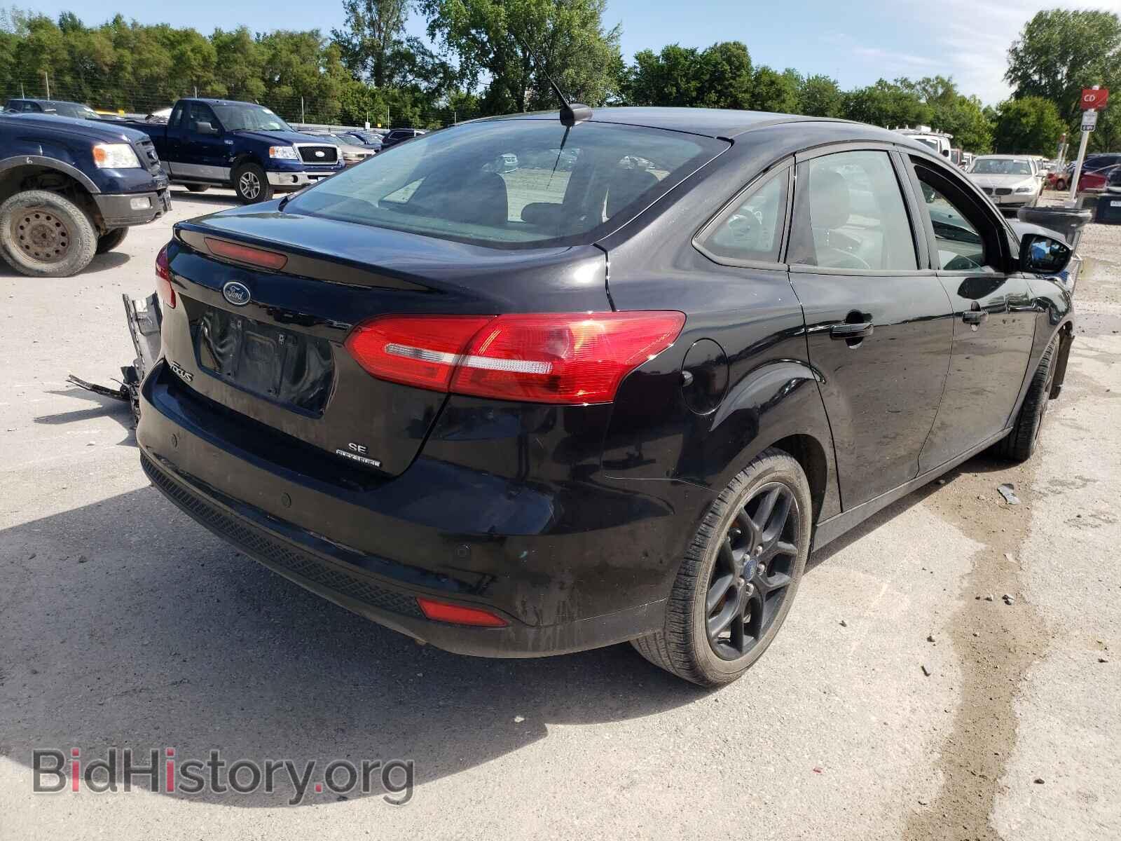 2016 FORD FOCUS - VIN: 1FADP3F21GL208815 - Photo 4