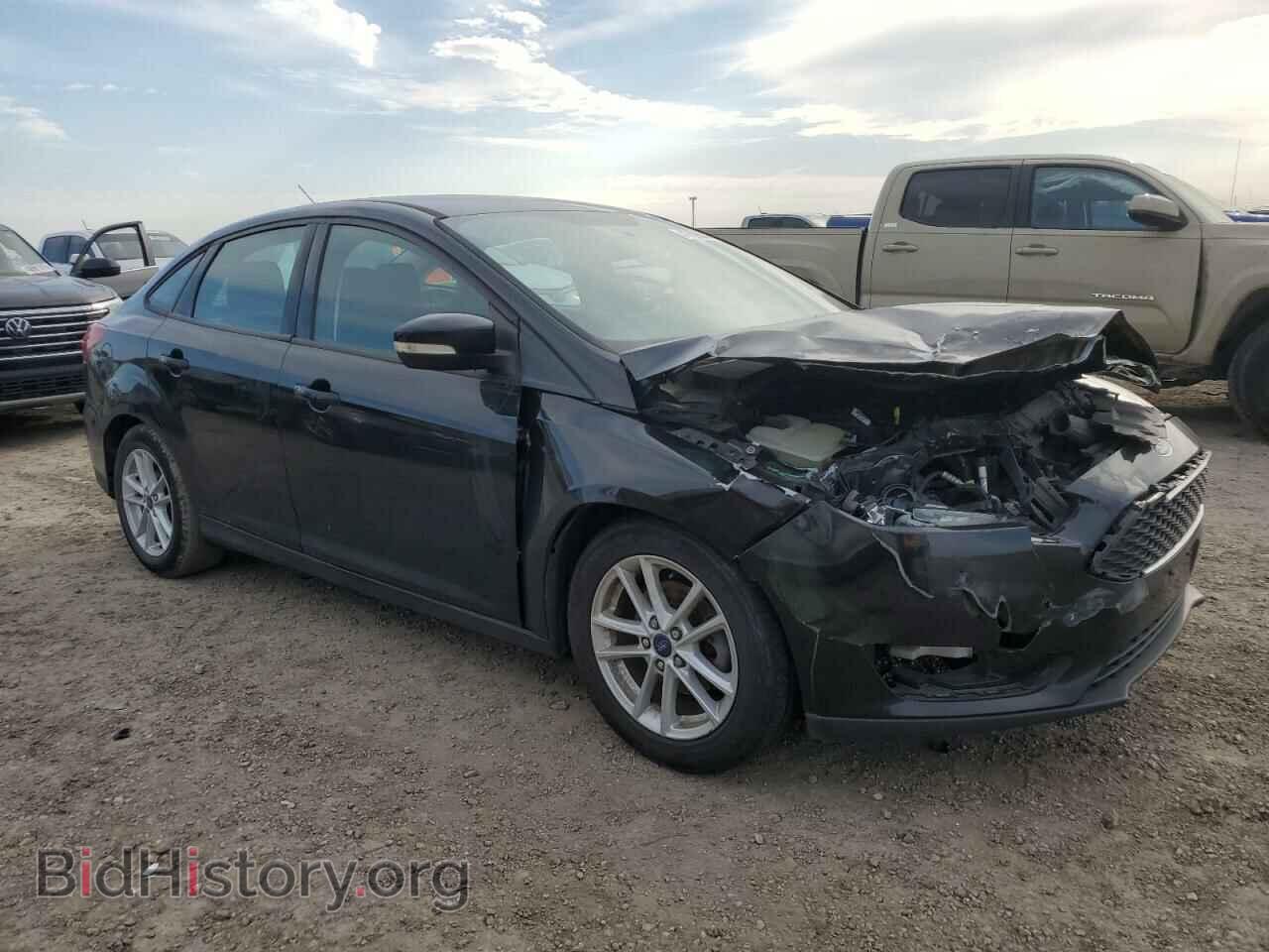 2015 FORD FOCUS - VIN: 1FADP3F22FL219997 - Photo 4