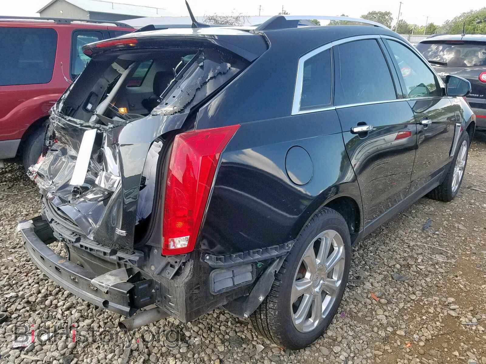 2013 CADILLAC SRX PERFOR - VIN: 3GYFNHE32DS655542 - Фото 4