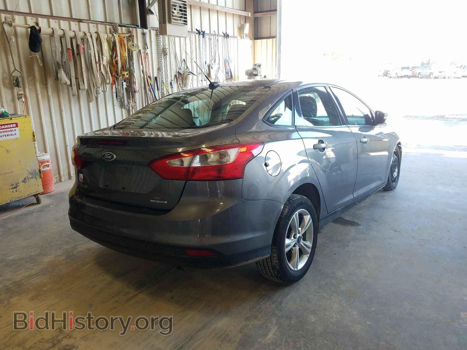 2014 FORD FOCUS - VIN: 1FADP3F28EL317723 - Photo 4
