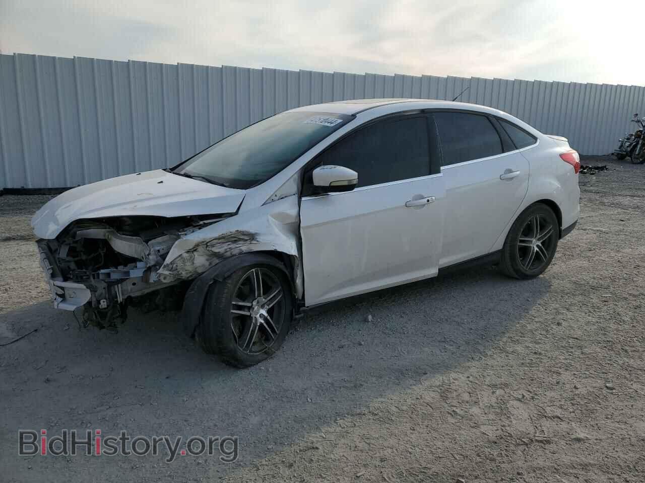 Фотография 1FAHP3J20CL319875 - FORD FOCUS 2012
