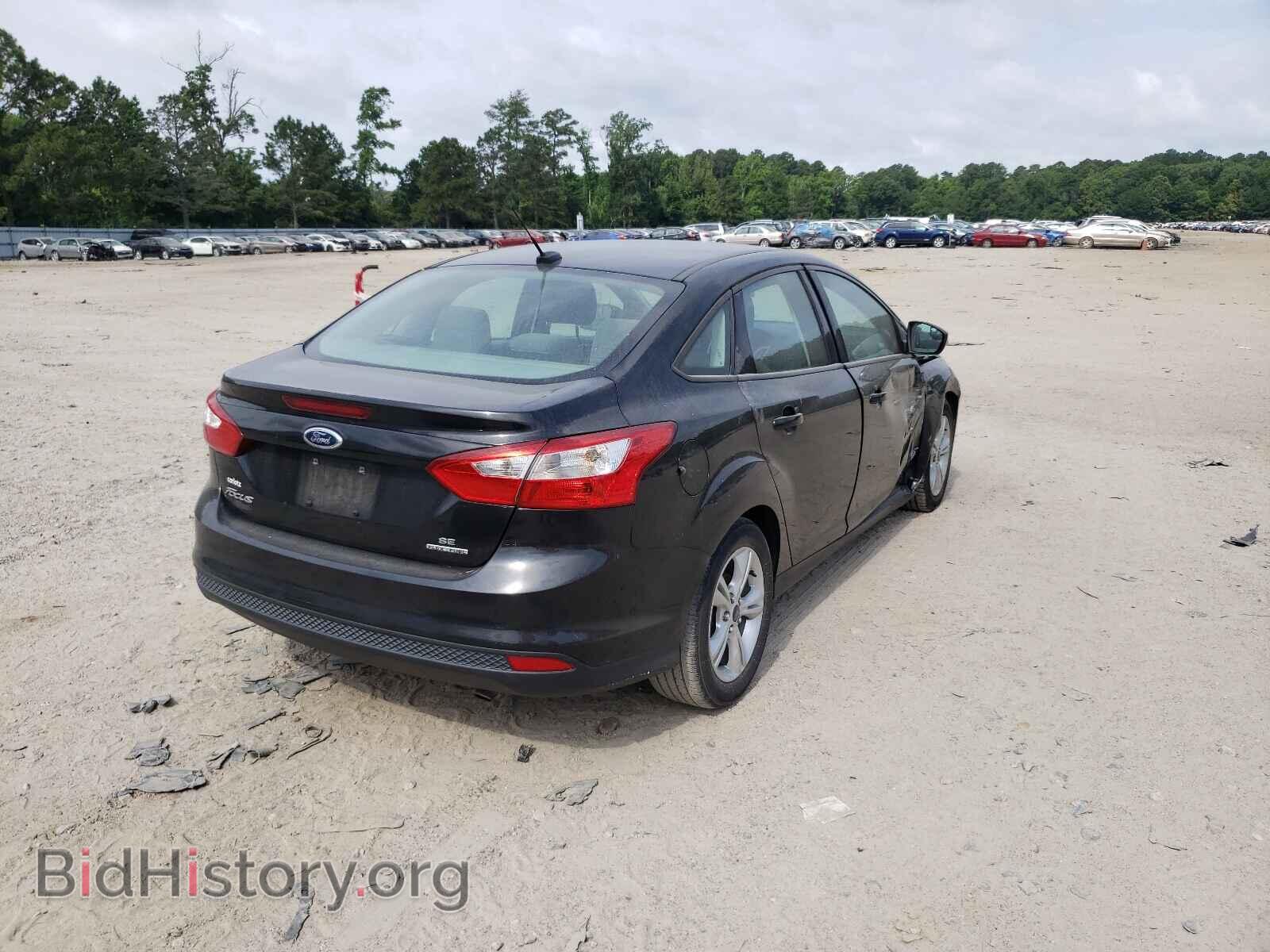 2014 FORD FOCUS - VIN: 1FADP3F2XEL403812 - Photo 4