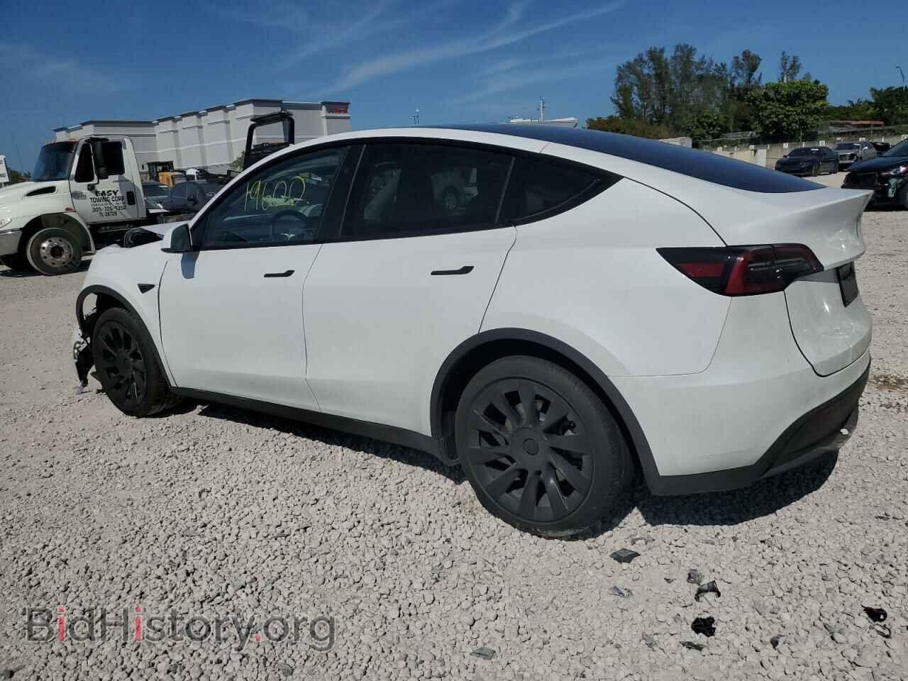 2023 TESLA MODEL Y - VIN: 7SAYGAEE9PF856484 - Фото 2