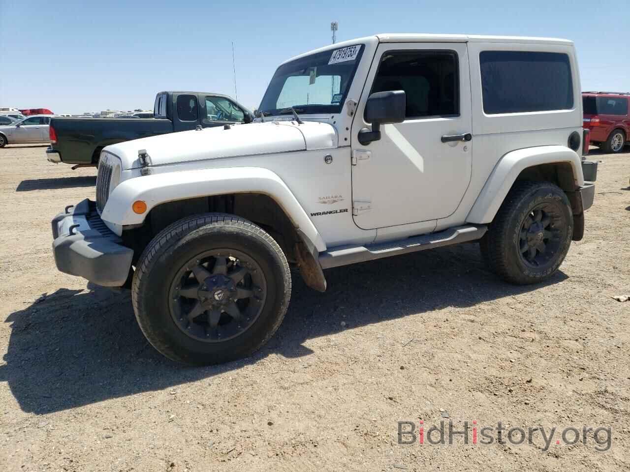 Photo 1J4AA5D19BL638129 - JEEP WRANGLER 2011