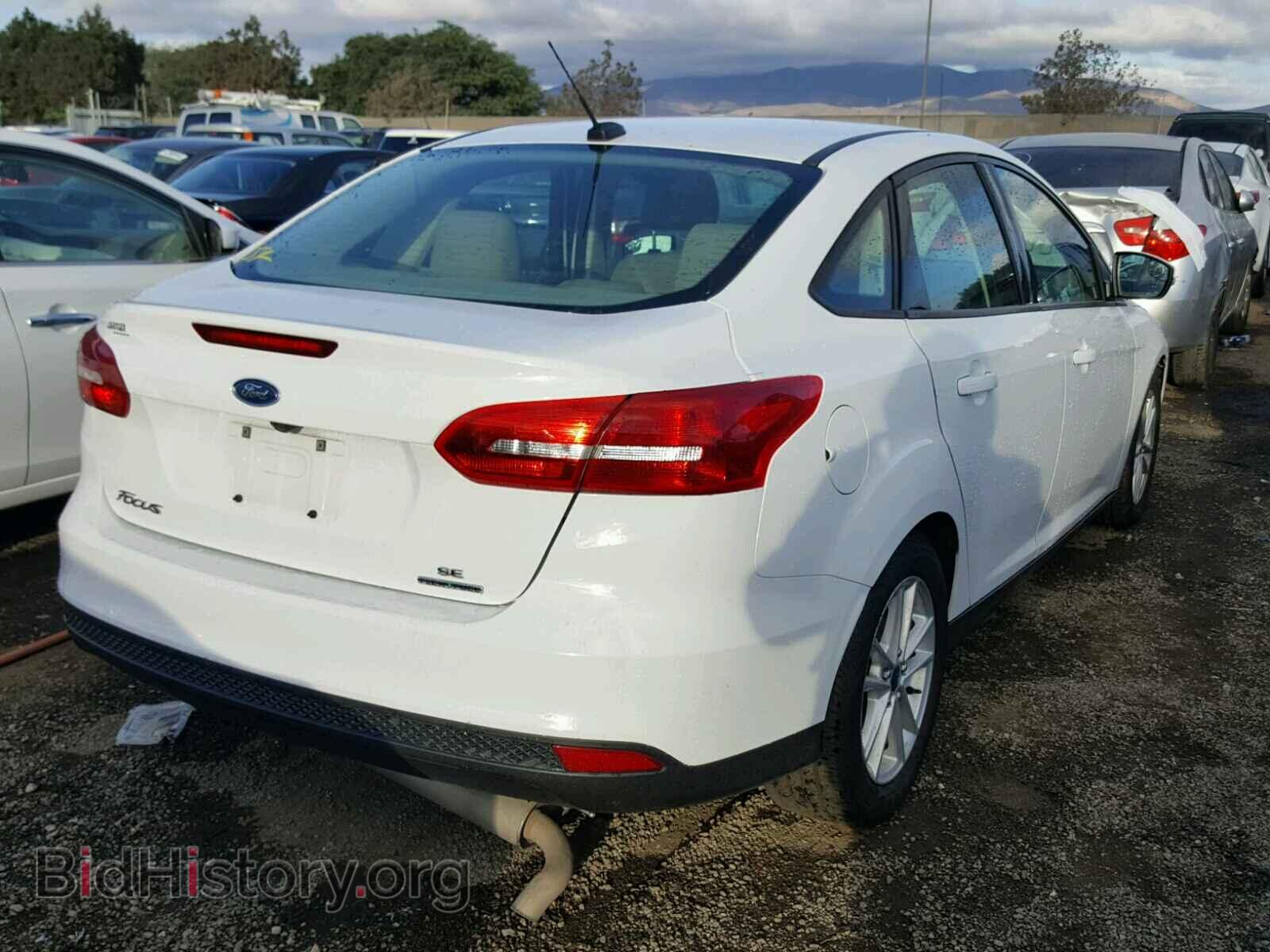 2016 FORD FOCUS - VIN: 1FADP3F24GL271052 - Photo 4