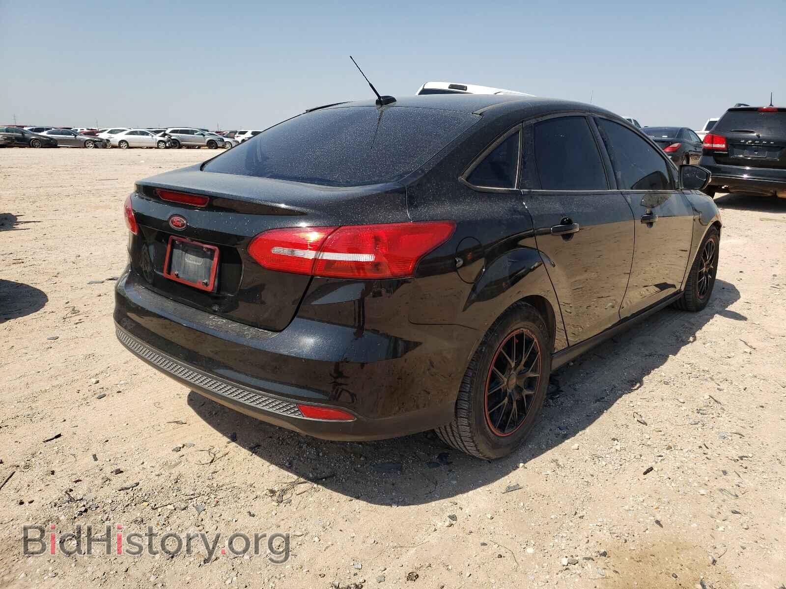 2015 FORD FOCUS - VIN: 1FADP3F20FL384902 - Photo 4