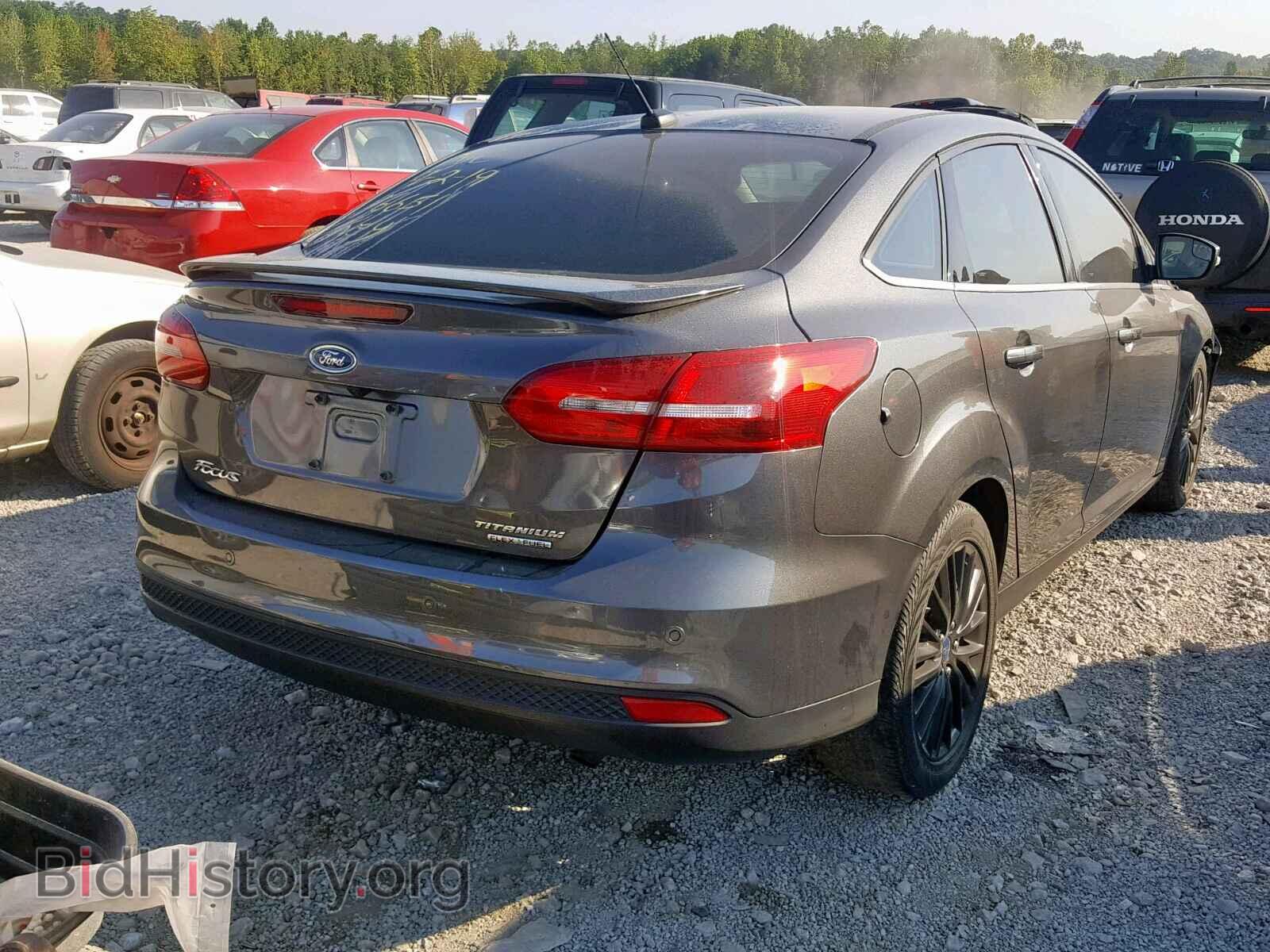 2015 FORD FOCUS - VIN: 1FADP3J24FL379208 - Photo 4