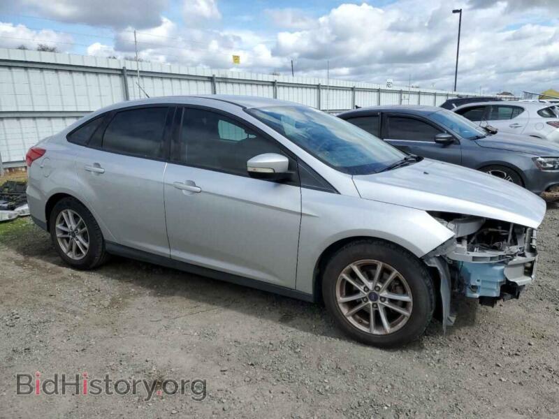 2015 Ford FOCUS (VIN 1FADP3F20FL384771) — photo 4 of 13
