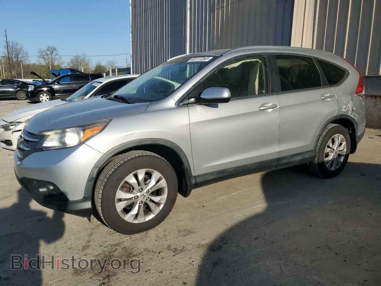 Фотография JHLRM3H75CC000581 - HONDA CRV 2012