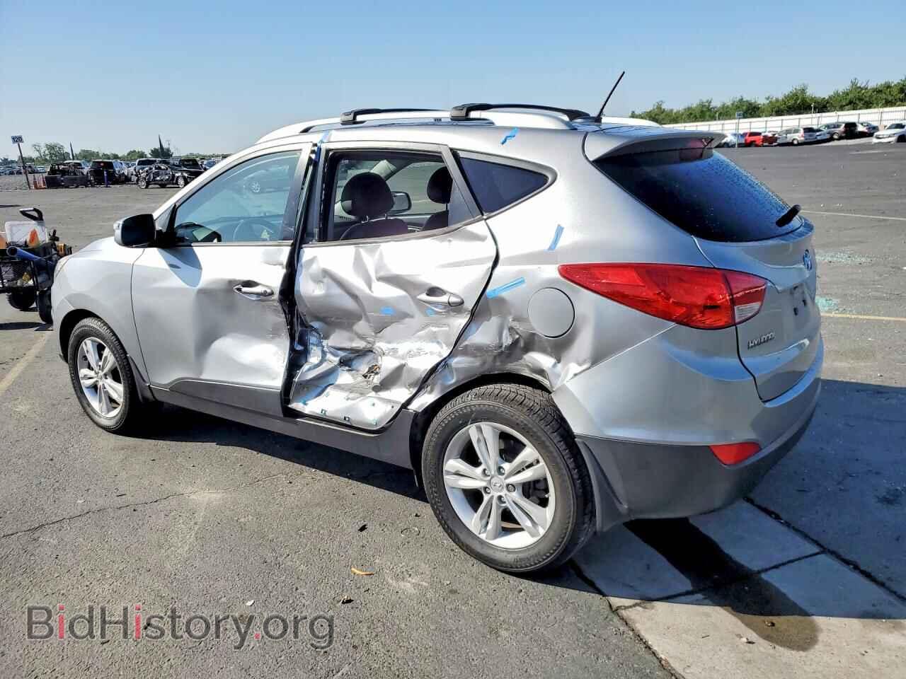 2012 HYUNDAI TUCSON - VIN: KM8JUCAC3CU470566 - Фото 2