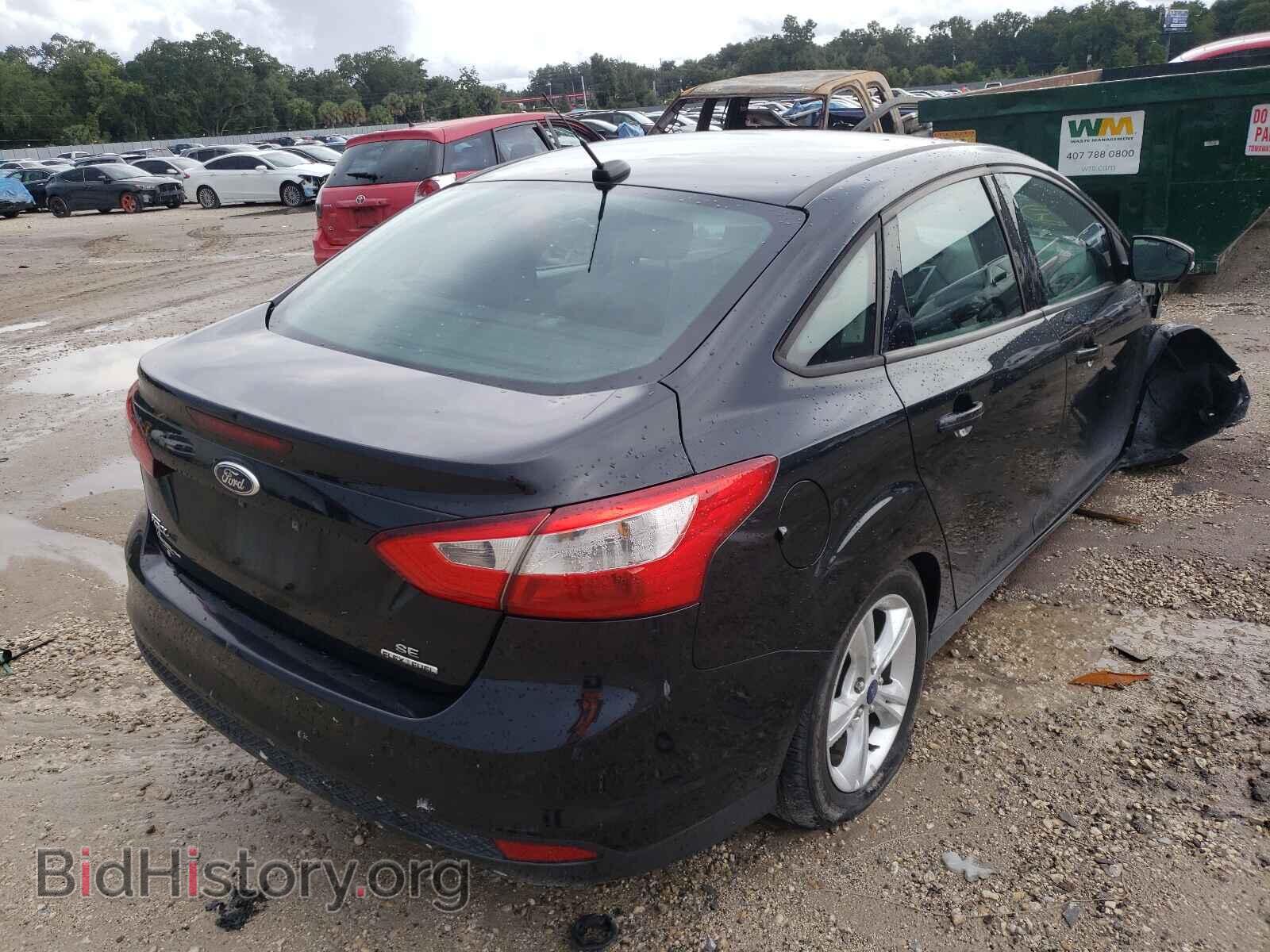 2014 FORD FOCUS - VIN: 1FADP3F21EL324335 - Photo 4