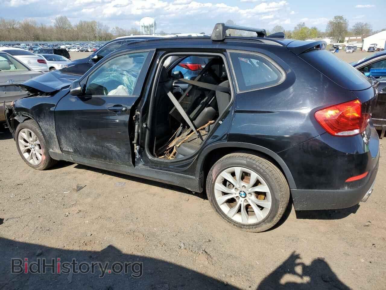 2014 BMW X1 - VIN: WBAVL1C58EVY21476 - Фото 2