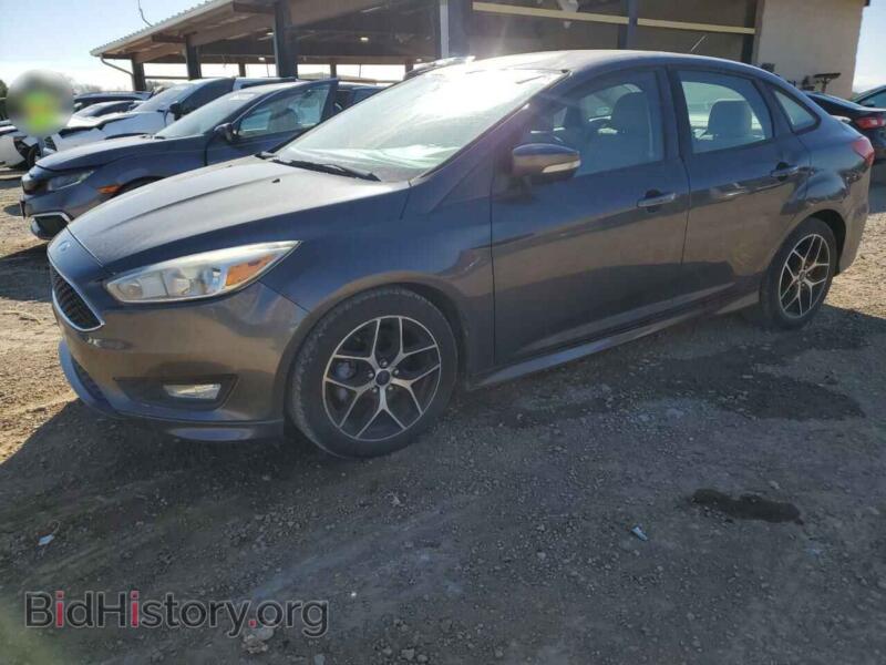 2015 Ford FOCUS SE (VIN 1FADP3F23FL311278) — photo 1 of 14, Copart, damage: top/roof