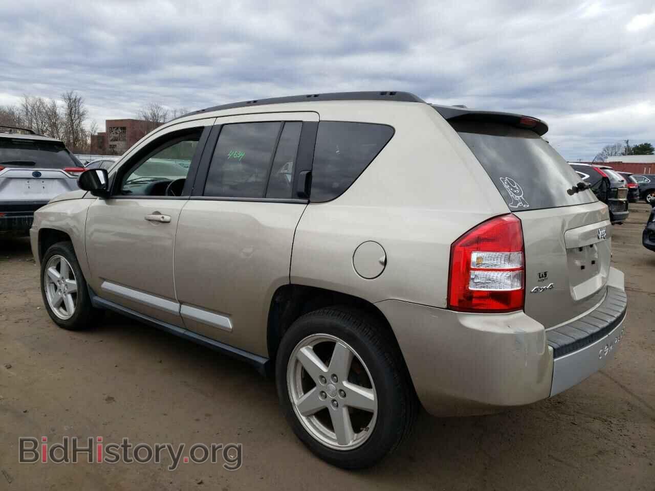 2010 JEEP COMPASS - VIN: 1J4NF5FB9AD599690 - Фото 2